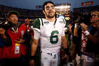 SAN DIEGO - JANUARY 17:  Quarterback Mark Sanchez #6 of the New York Jets walks off the field after the AFC Divisional Playoff Game against the San Diego Chargers at Qualcomm Stadium on January 17, 2010 in San Diego, California. The Jets defeated the Char