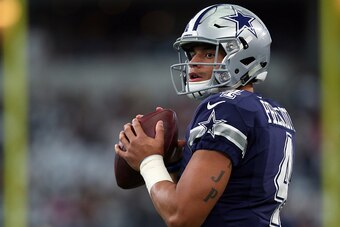 ARLINGTON, TX - NOVEMBER 24:   Dak Prescott #4 of the Dallas Cowboys warms up on the field prior to the game against the Washington Redskins at AT&T Stadium on November 24, 2016 in Arlington, Texas.  (Photo by Tom Pennington/Getty Images)