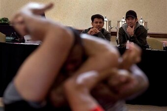 Joe Silva (no longer with the UFC) and Sean Shelby (right) scouting talent.