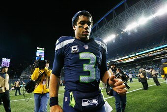 SEATTLE, WA - JANUARY 07:  Russell Wilson #3 of the Seattle Seahawks leaves the field after defeating the Detroit Lions 26-6 in the NFC Wild Card game at CenturyLink Field on January 7, 2017 in Seattle, Washington.  (Photo by Jonathan Ferrey/Getty Images)