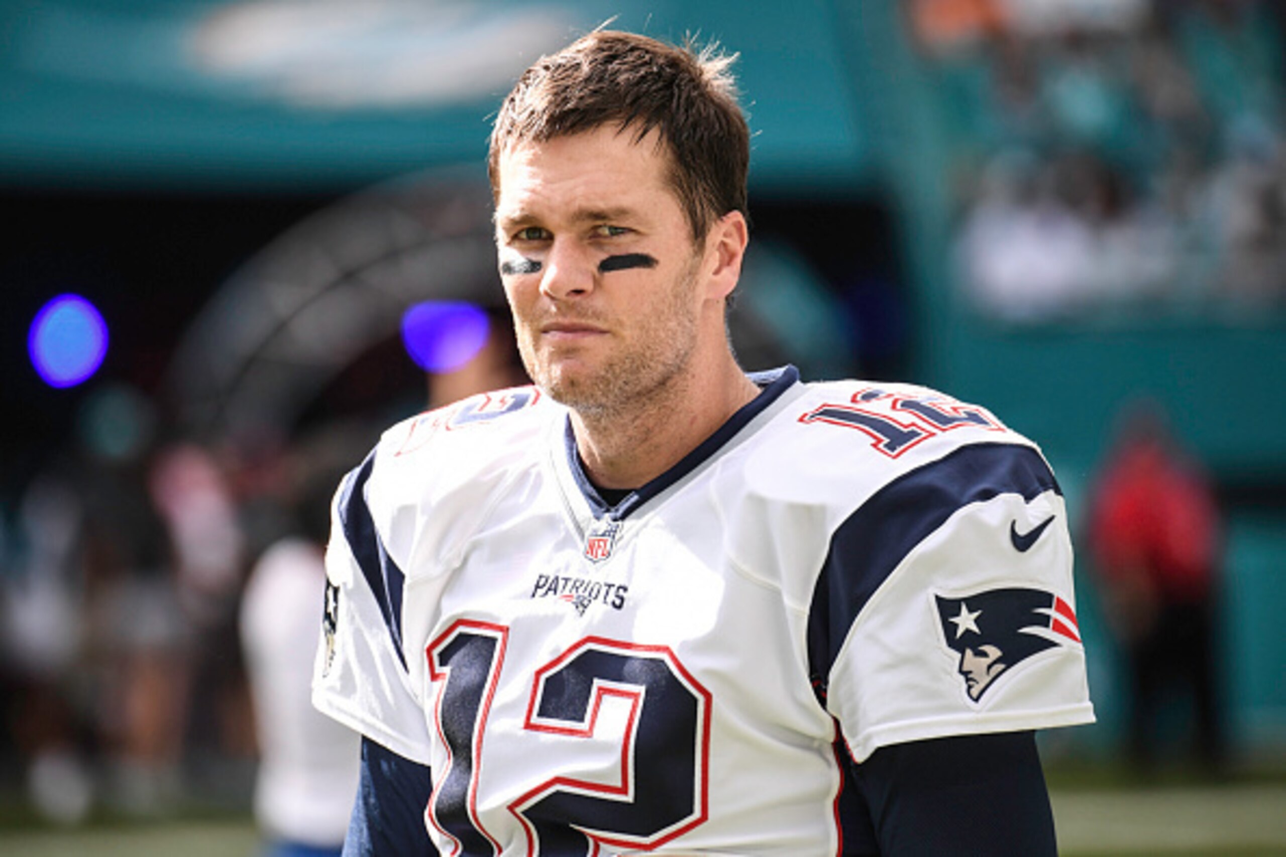 MIAMI GARDENS, FL - JANUARY 01:  Quarterback Tom Brady #12 of the New England Patriots looks on during a NFL game against the Miami Dolphins on January 1, 2017 at Hard Rock Stadium in Miami Gardens, Florida.  (Photo by Ron Elkman/Sports Imagery/ Getty Ima