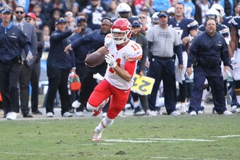 SAN DIEGO, CA - JANUARY 01: Alex Smith #11 of Kansas City Chiefs carries the ball against the San Diego Chargers during a NFL game at Qualcomm Stadium on January 1, 2017 in San Diego, California.  (Photo by Leon Bennett/Getty Images)