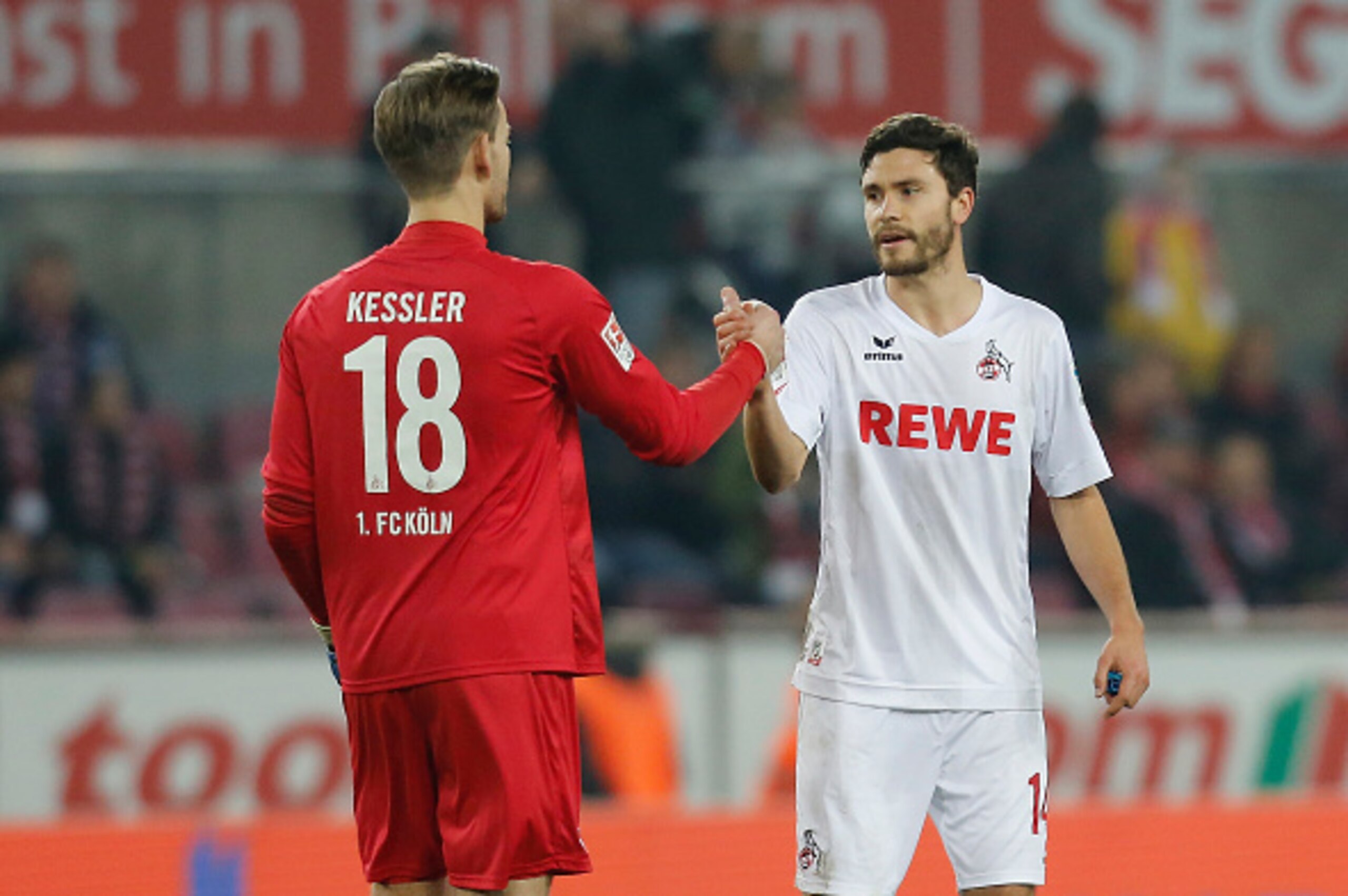 COLOGNE, GERMANY - NOVEMBER 26: goalkeeper Thomas Kessler of FC Koeln shakes hands with Jonas Hector during the Bundesliga match between 1. FC Koeln and FC Augsburg at Rheinenergiestadion on November 26, 2016 in Cologne, Germany. (Photo by TF-Images/Ge COLOGNE, GERMANY - NOVEMBER 26: goalkeeper Thomas Kessler of FC Koeln shakes hands with Jonas Hector during the Bundesliga match between 1. FC Koeln and FC Augsburg at Rheinenergiestadion on November 26, 2016 in Cologne, Germany. (Photo by TF-Images/Ge