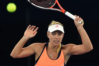 Angelique Kerber of Germany hits a return during a practice session ahead of the Australian Open tennis tournament in Melbourne on January 13, 2017. / AFP / PAUL CROCK / --IMAGE RESTRICTED TO EDITORIAL USE - STRICTLY NO COMMERCIAL USE--        (Photo cred
