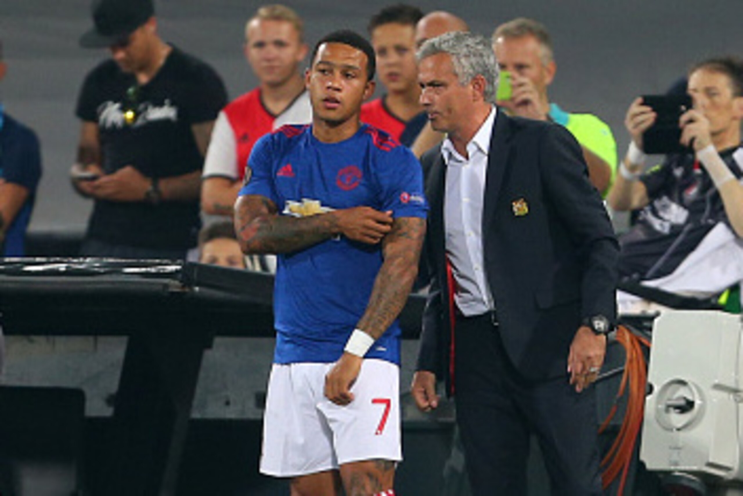 ROTTERDAM, NETHERLANDS - SEPTEMBER 15: Jose Mourinho Manager of Manchester United talks to Memphis Depay of Manchester United as he and Zlatan Ibrahimovic of Manchester United covers his face during the UEFA Europa League match between Feyenoord and Manch