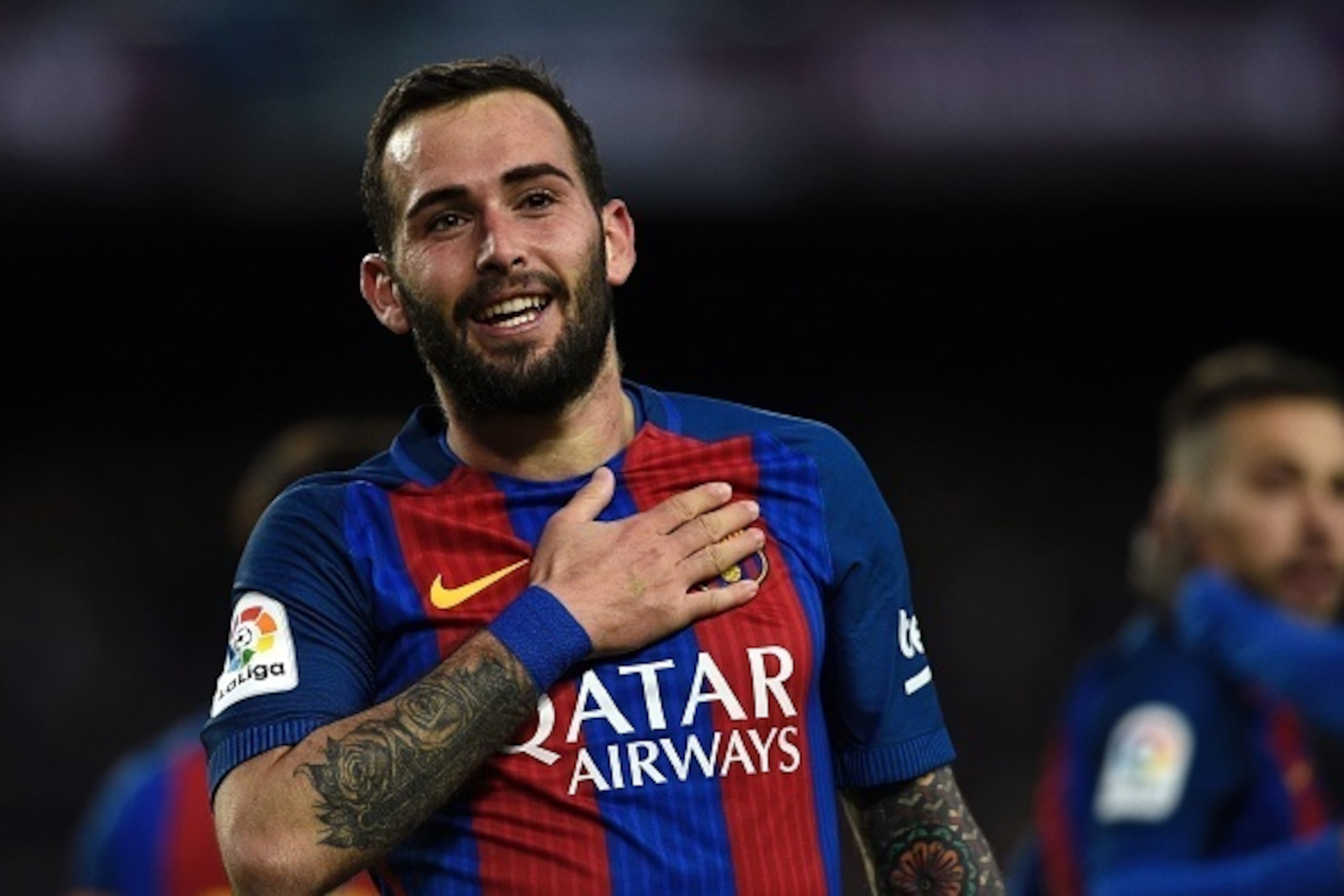 Barcelona's defender Aleix Vidal celebrates after scoring a goal during the Spanish league football match FC Barcelona vs UD Las Palmas at the Camp Nou stadium in Barcelona on January 14, 2017. / AFP / LLUIS GENE        (Photo credit should read LLUIS GEN