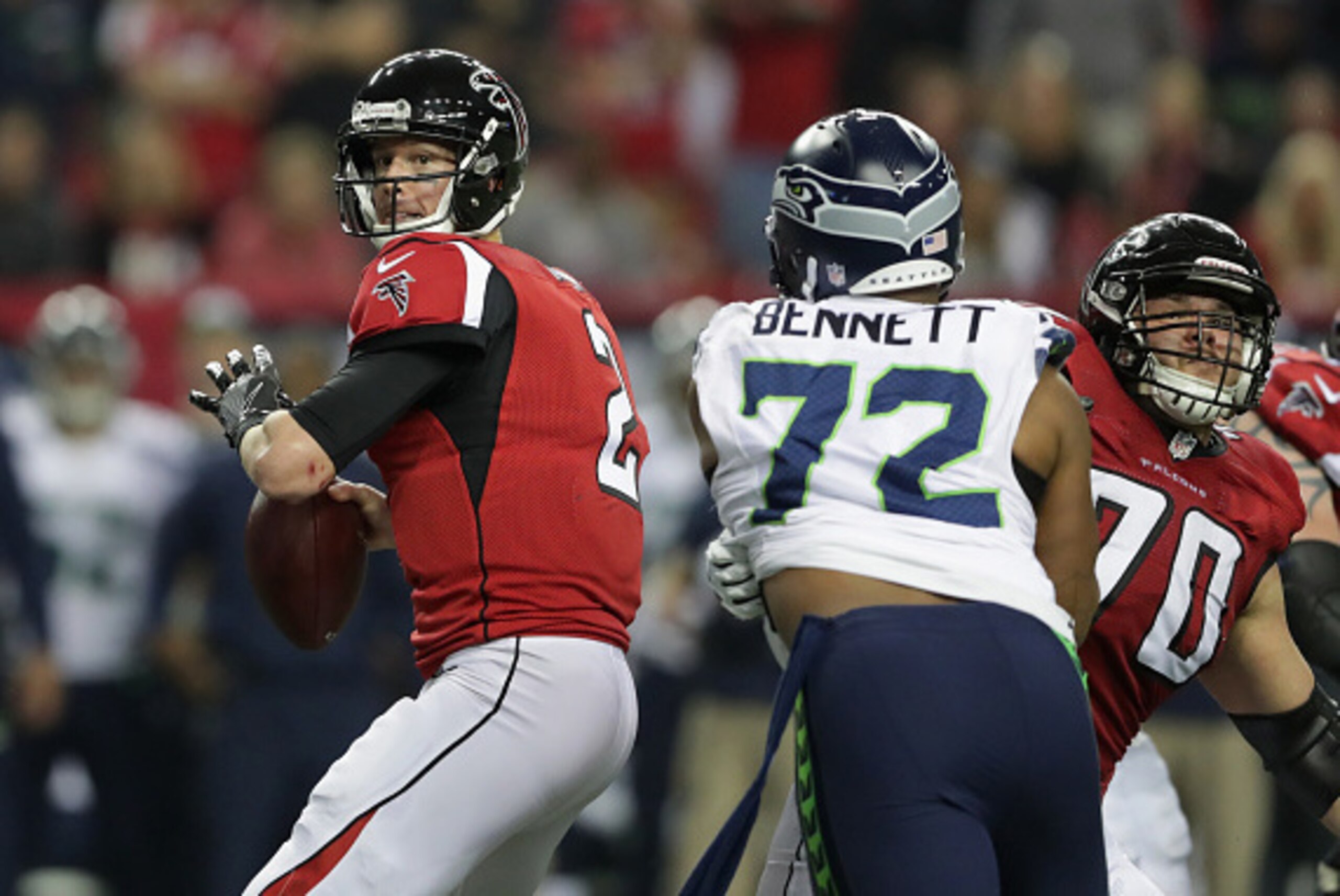 ATLANTA, GA - JANUARY 14:  Matt Ryan #2 of the Atlanta Falcons passes the ball against the Seattle Seahawks at the Georgia Dome on January 14, 2017 in Atlanta, Georgia.  (Photo by Streeter Lecka/Getty Images)