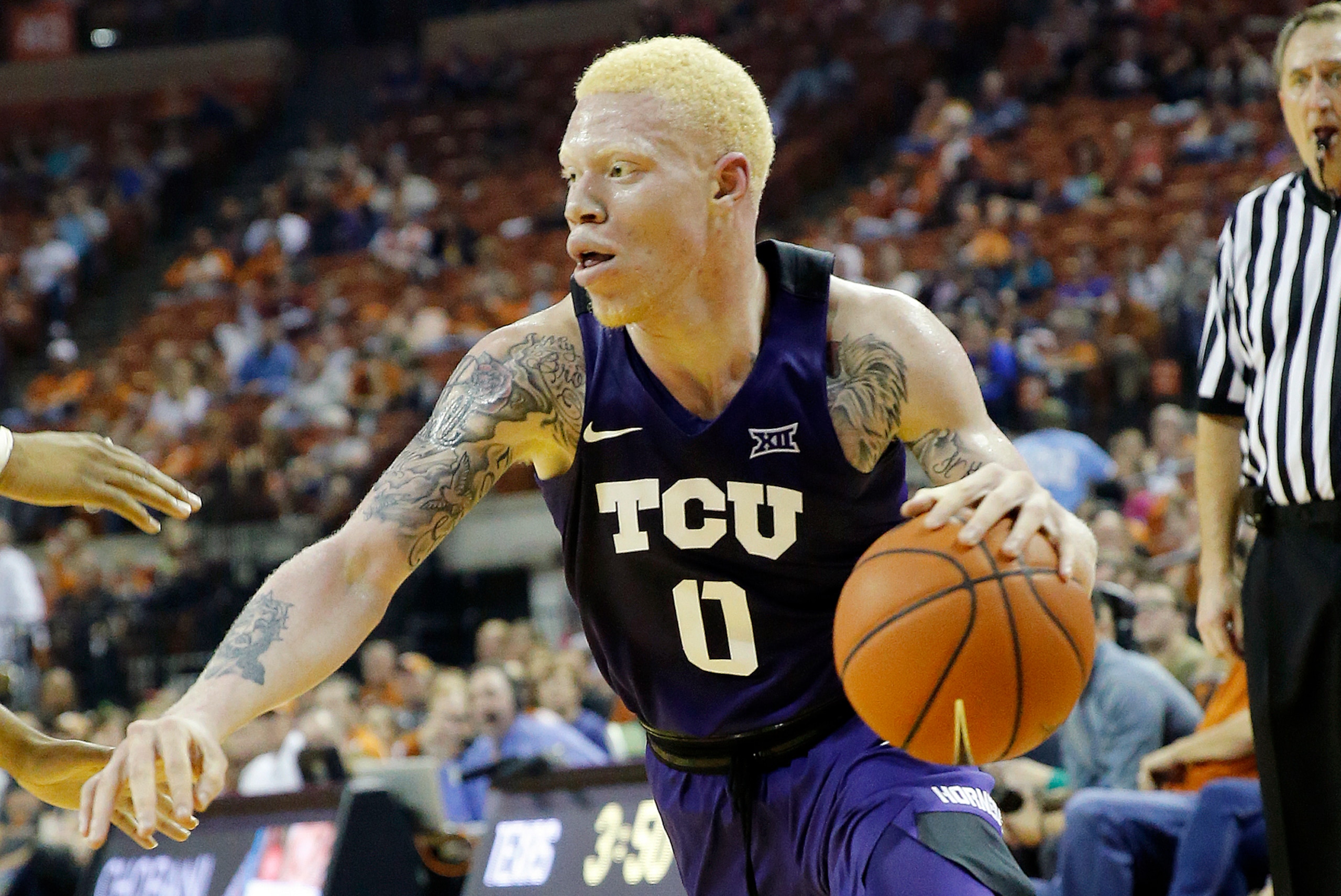 AUSTIN, TX - JANUARY 11: Jaylen Fisher #0 of the TCU Horned Frogs drives against the Texas Longhorns at the Frank Erwin Center on January 11, 2017 in Austin, Texas. (Photo by Chris Covatta/Getty Images)