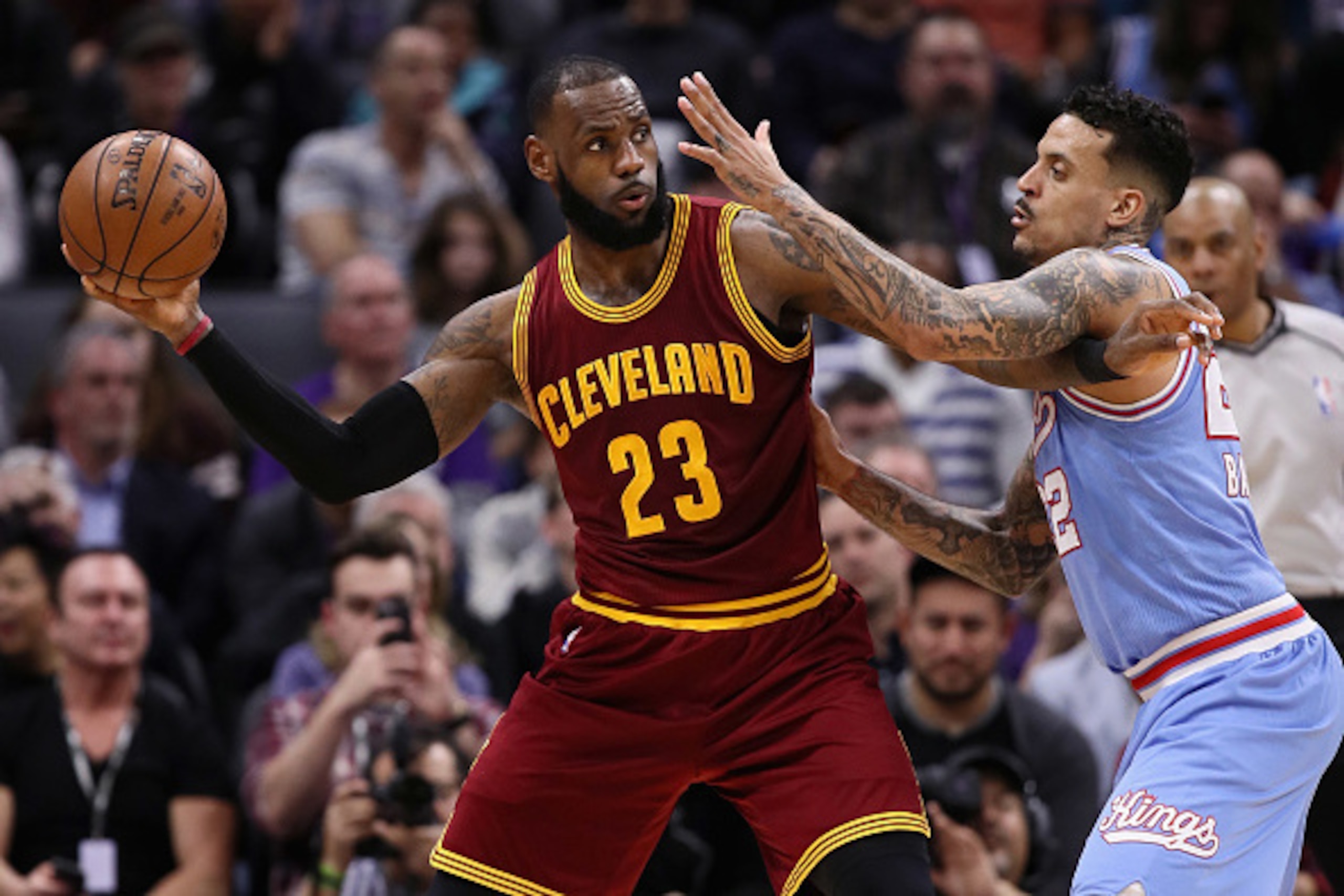 SACRAMENTO, CA - JANUARY 13:  LeBron James #23 of the Cleveland Cavaliers is guarded by Matt Barnes #22 of the Sacramento Kings at Golden 1 Center on January 13, 2017 in Sacramento, California.  NOTE TO USER: User expressly acknowledges and agrees that, b