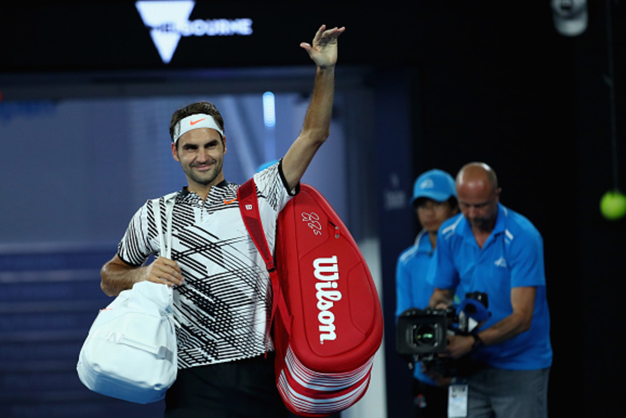 MELBOURNE, AUSTRALIA - JANUARY 16:  Roger Federer of Switzerland waves to the crowd as he leaves the court after victory in his first round match against Jurgen Melzer of Austria on day one of the 2017 Australian Open at Melbourne Park on January 16, 2017