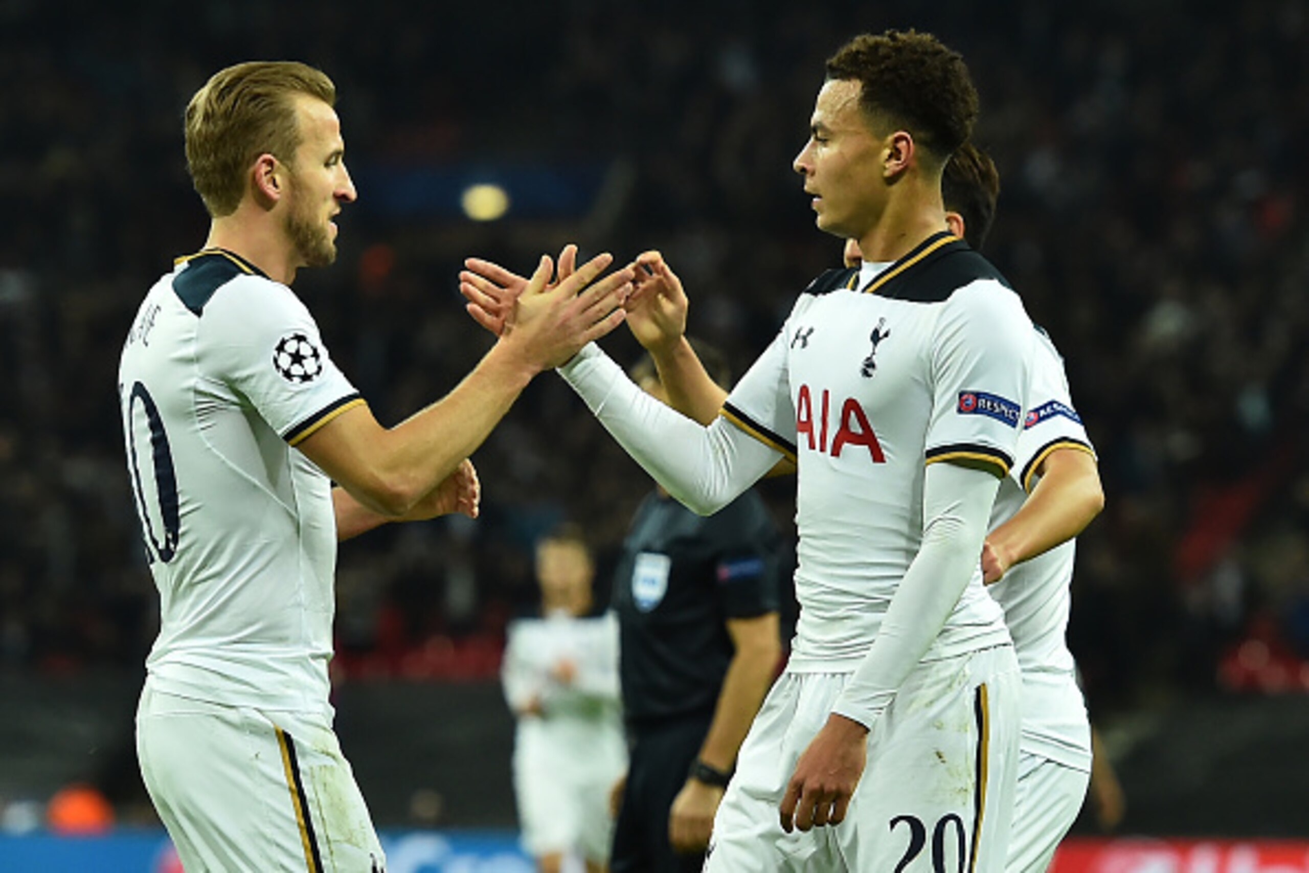 Tottenham Hotspur's English midfielder Dele Alli (R) celebrates with Tottenham Hotspur's English striker Harry Kane (L) after scoring their first goal during the UEFA Champions League group E football match between Tottenham Hotspur and CSKA Moscow at Wem