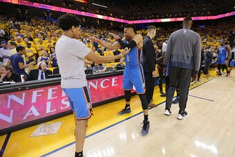 OAKLAND, CA - MAY 16:  Russell Westbrook #0 and Cameron Payne #22 of the Oklahoma City Thunder perform their pregame dance routine before the game against the Golden State Warriors in Game One of the Western Conference Finals during the 2016 NBA Playoffs 