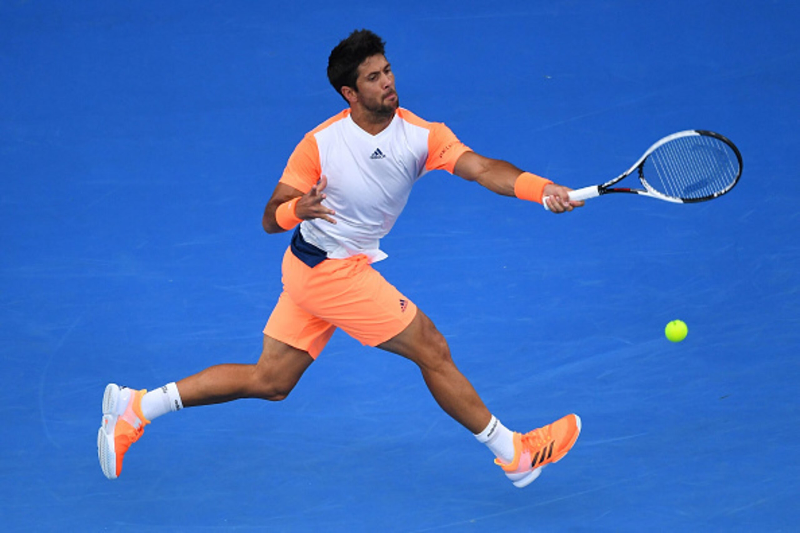 MELBOURNE, AUSTRALIA - JANUARY 17:  Fernando Verdasco of Spain plays a forehand in his first round match against Novak Djokovic of Serbia on day two of the 2017 Australian Open at Melbourne Park on January 17, 2017 in Melbourne, Australia.  (Photo by Quin