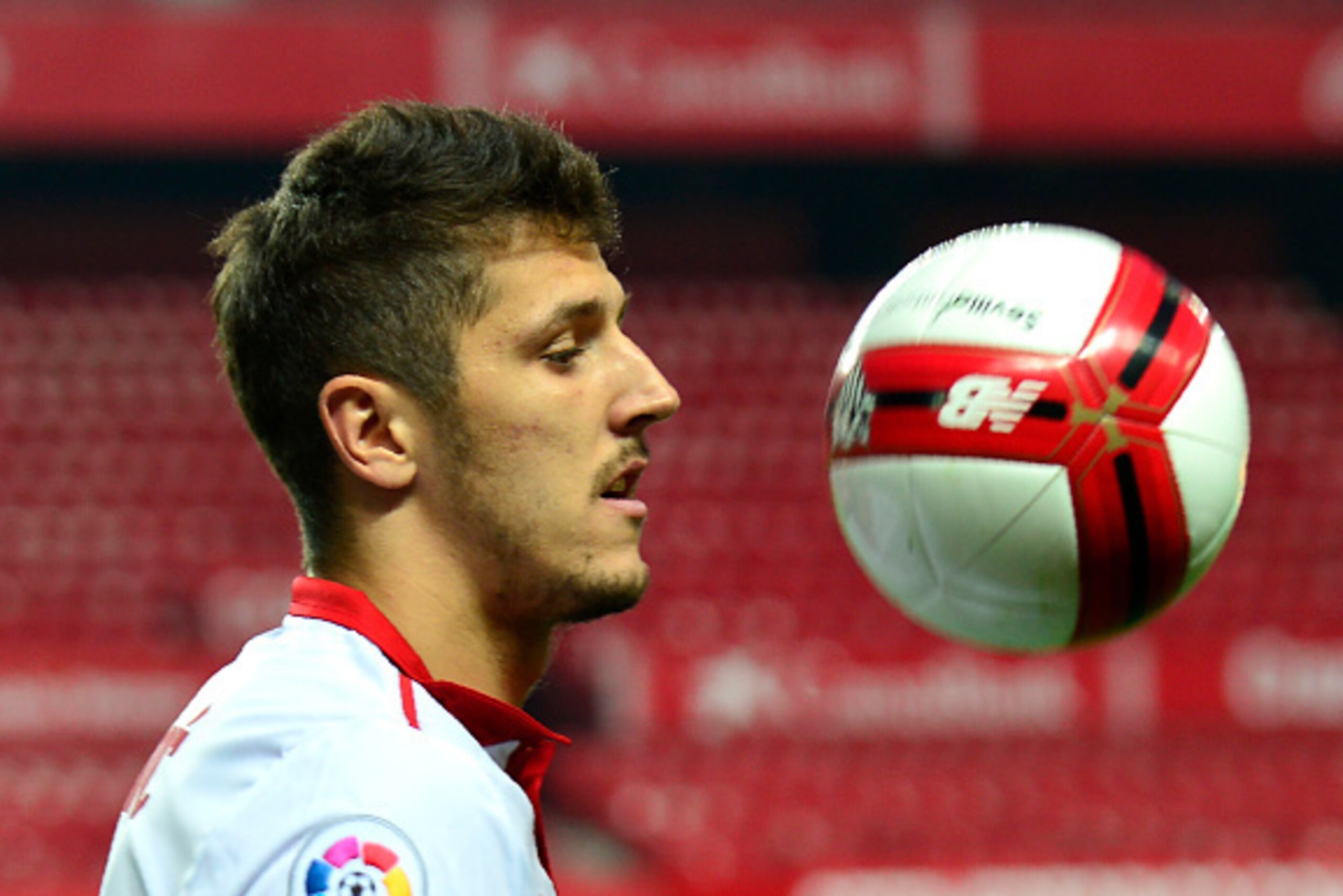 Sevilla's new signing Montenegrin Stevan Jovetic controls a ball during his official presentation at the  Sanchez Pizjuan stadium on January 10, 2017. / AFP / CRISTINA QUICLER        (Photo credit should read CRISTINA QUICLER/AFP/Getty Images)
