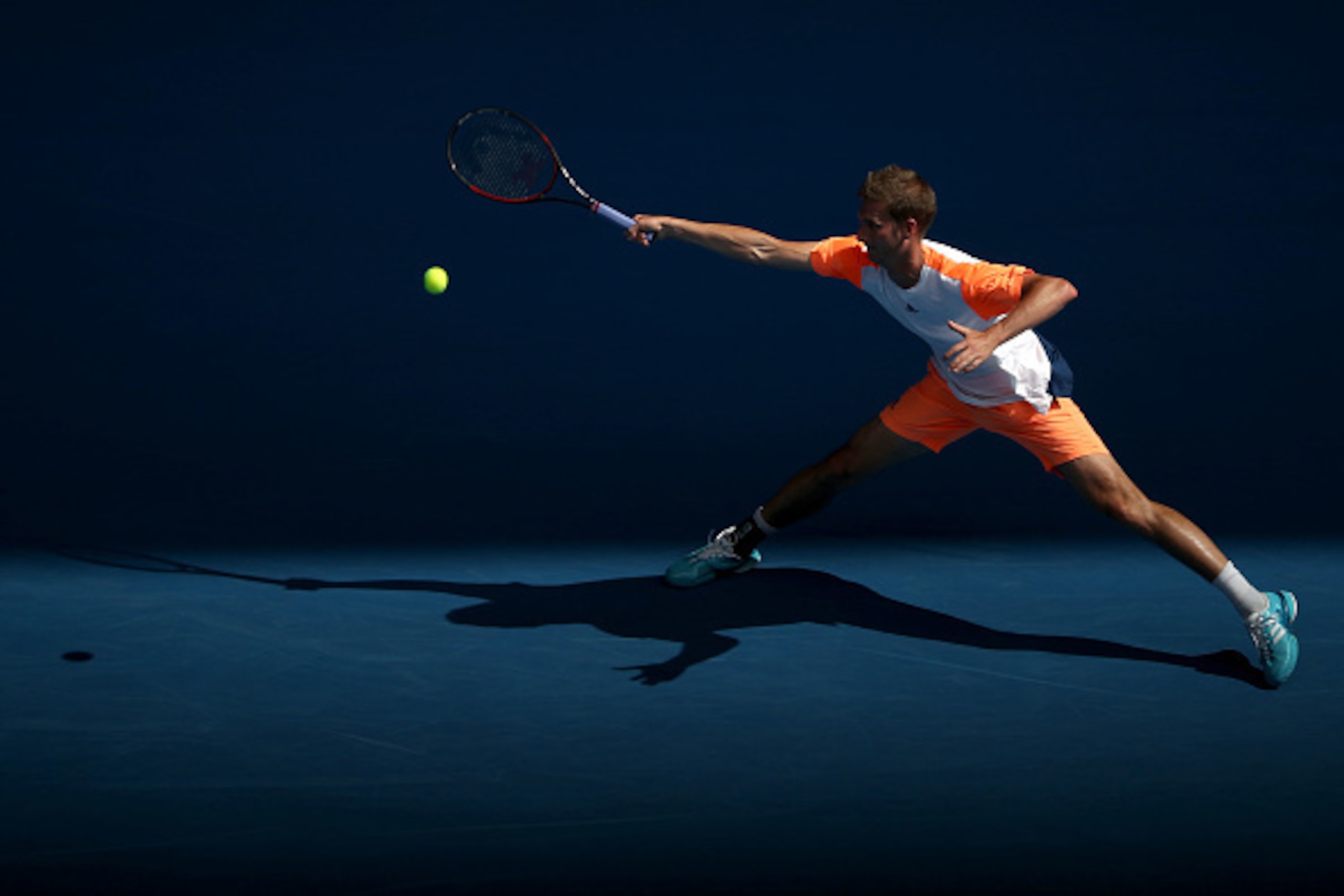 MELBOURNE, AUSTRALIA - JANUARY 17:  Florian Mayer of Germany plays a forehand in his first round match against Rafael Nadal of Spain on day two of the 2017 Australian Open at Melbourne Park on January 17, 2017 in Melbourne, Australia.  (Photo by Mark Kolb