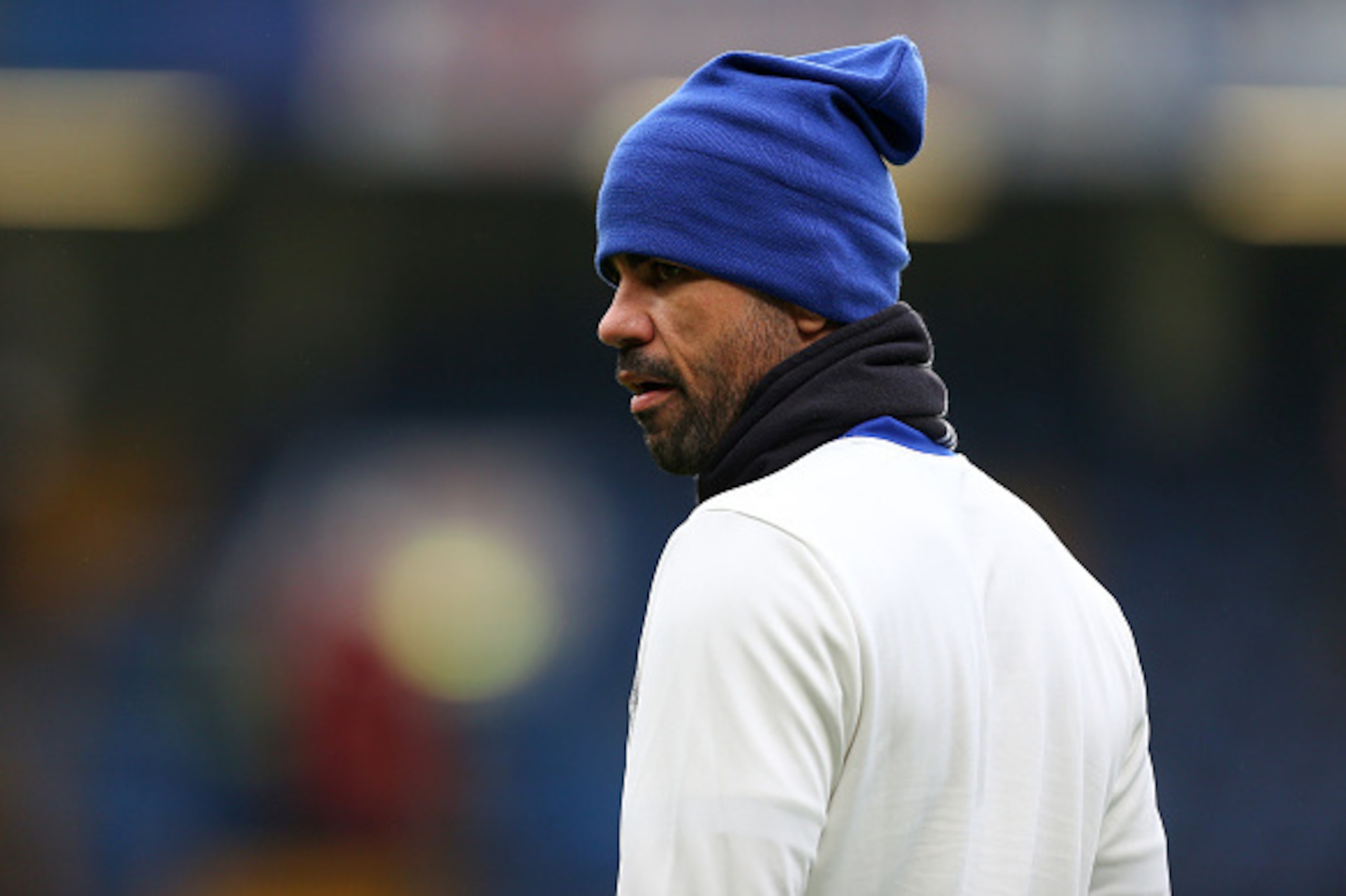 LONDON, ENGLAND - JANUARY 08: Diego Costa of Chelsea wearing a hat as he warms up before the Emirates FA Cup Third Round between Chelsea and Peterborough United at Stamford Bridge on January 8, 2017 in London, England. (Photo by Catherine Ivill - AMA/Gett