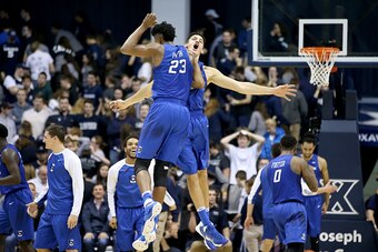 CINCINNATI, OH - JANUARY 16:  Justin Patton #23 and Martin Krampelj #15 of the Creighton Blue Jays celebrate after the 72-67 win over the Xavier Musketeers at Cintas Center on January 16, 2017 in Cincinnati, Ohio.  (Photo by Andy Lyons/Getty Images)
