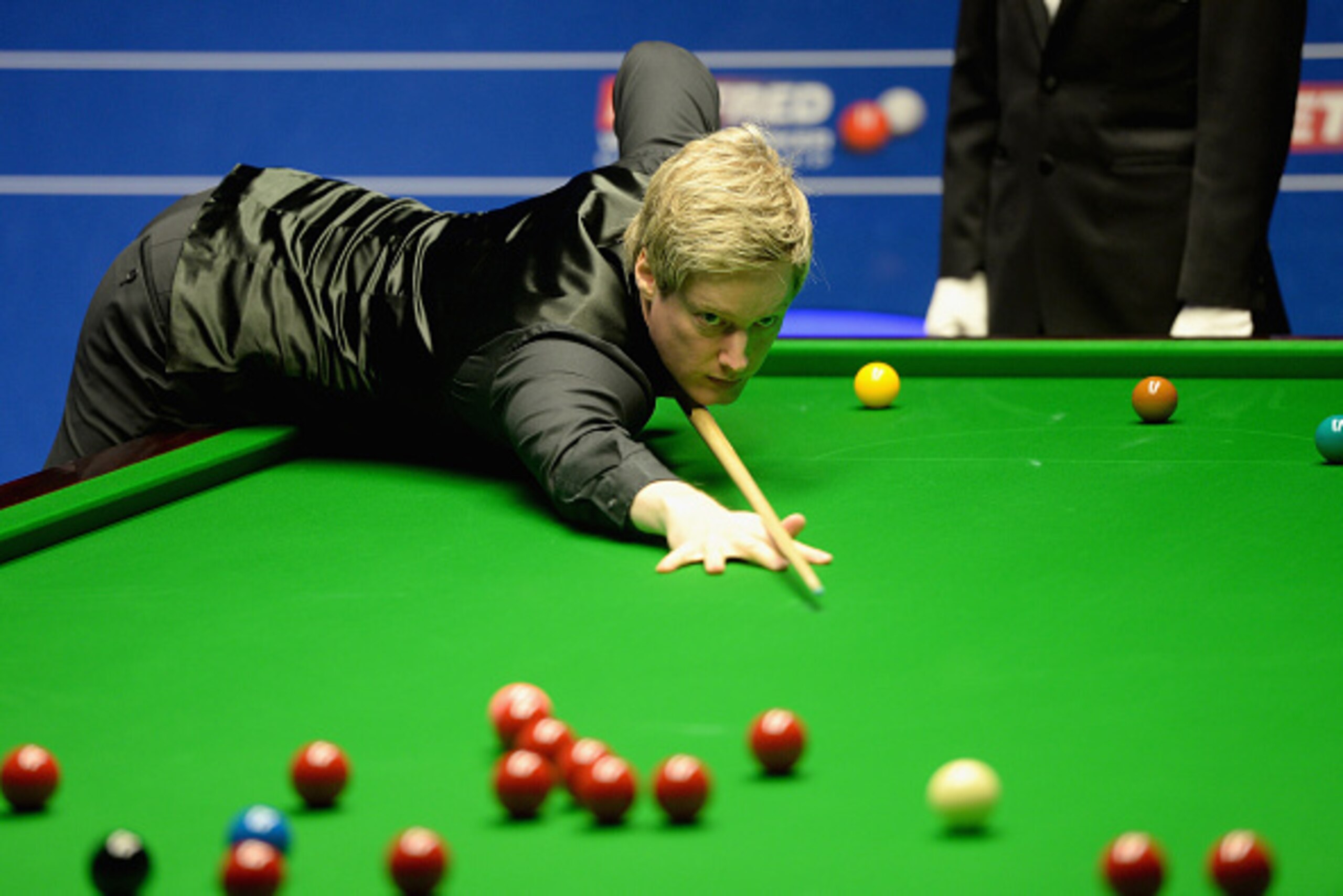SHEFFIELD, ENGLAND - APRIL 19:  Neil Robertson plays a shot against Michael Holt during their first round match of the World Snooker Championship at Crucible Theatre on April 19, 2016 in Sheffield, England.  (Photo by Gareth Copley/Getty Images)
