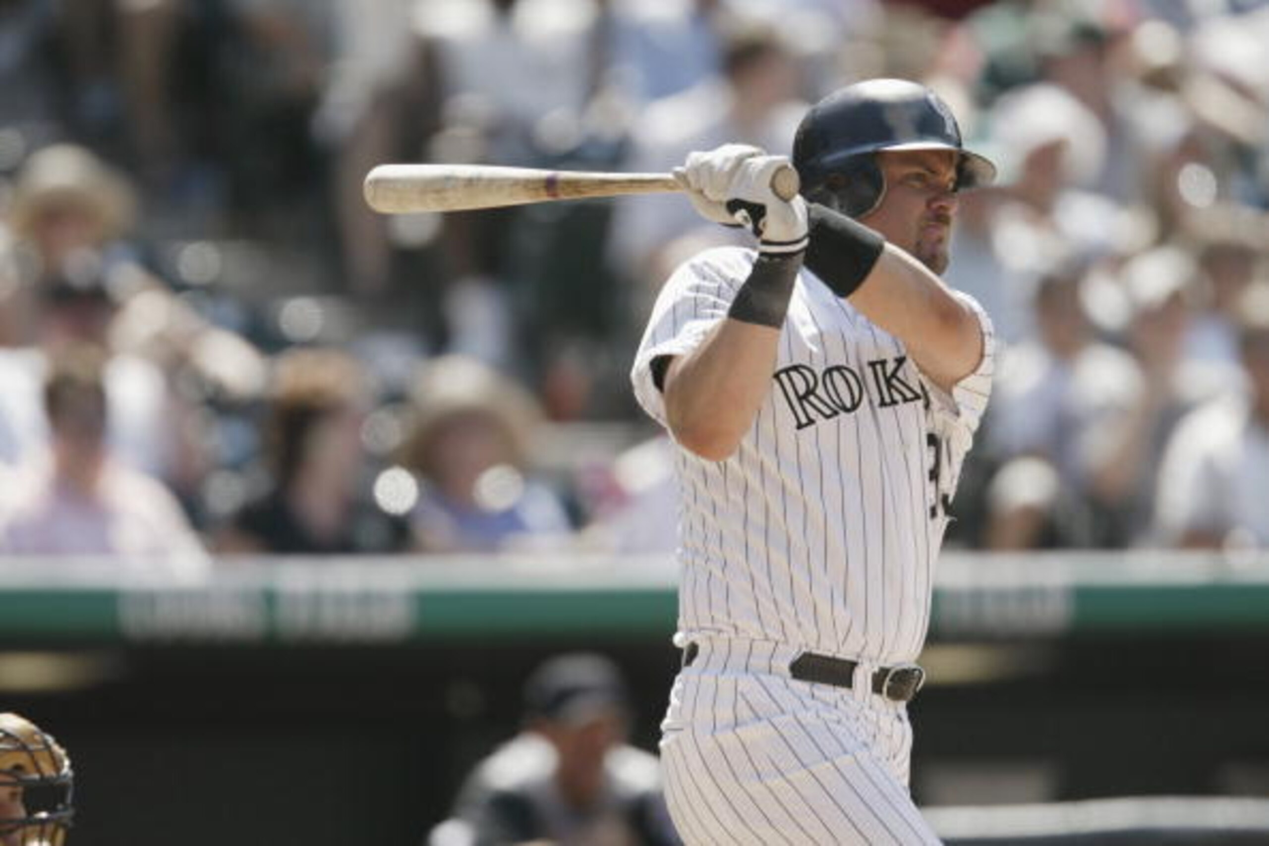 DENVER - JULY 18:  Right fielder Larry Walker #33 of the Colorado Rockies swings his bat during the MLB game against the Arizona Diamondbacks on July 18, 2002 at Coors Field in Denver, Colorado.  The Rockies won 6-4.  (Photo by Brian Bahr/Getty Images)