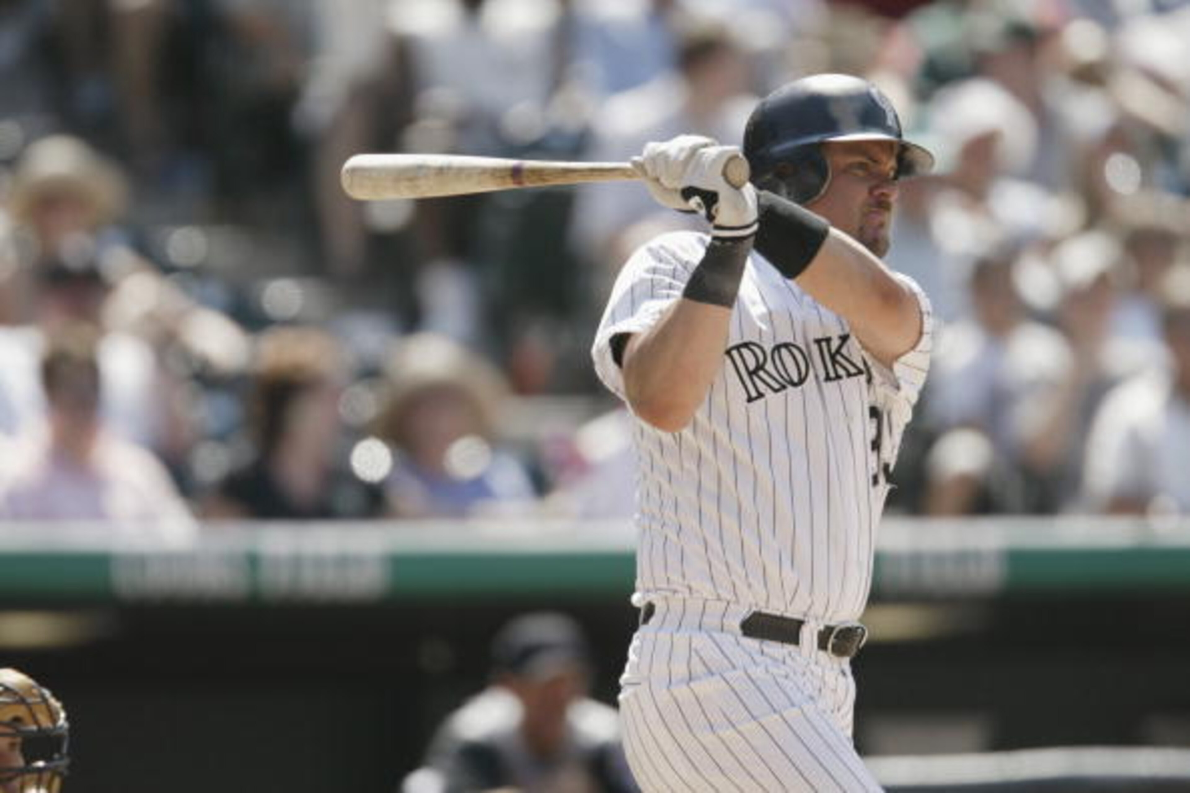 DENVER - JULY 18:  Right fielder Larry Walker #33 of the Colorado Rockies swings his bat during the MLB game against the Arizona Diamondbacks on July 18, 2002 at Coors Field in Denver, Colorado.  The Rockies won 6-4.  (Photo by Brian Bahr/Getty Images)