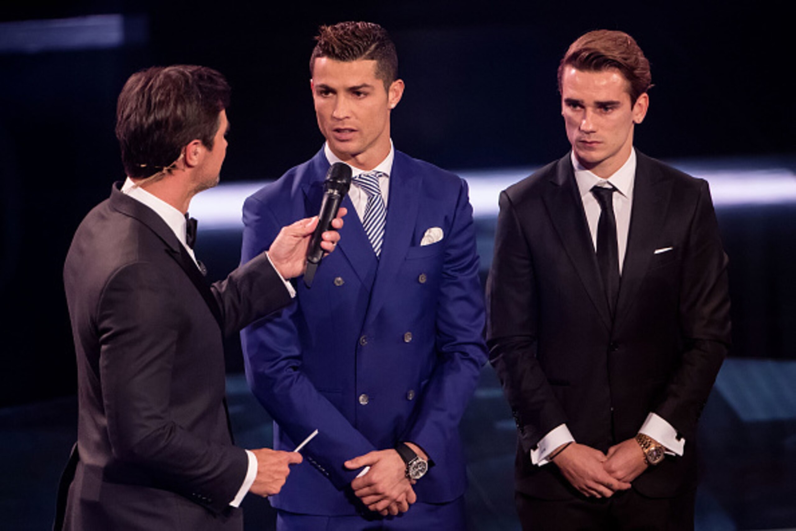 ZURICH, SWITZERLAND - JANUARY 09: Presenter Marco Schreyl (L) speaks with The Best FIFA Men's Player Award nominees Cristiano Ronaldo of Portugal and Real Madrid (C) and Antoine Griezmann of France and Atletico Madrid (R) during The Best FIFA Football Awa ZURICH, SWITZERLAND - JANUARY 09: Presenter Marco Schreyl (L) speaks with The Best FIFA Men's Player Award nominees Cristiano Ronaldo of Portugal and Real Madrid (C) and Antoine Griezmann of France and Atletico Madrid (R) during The Best FIFA Football Awa