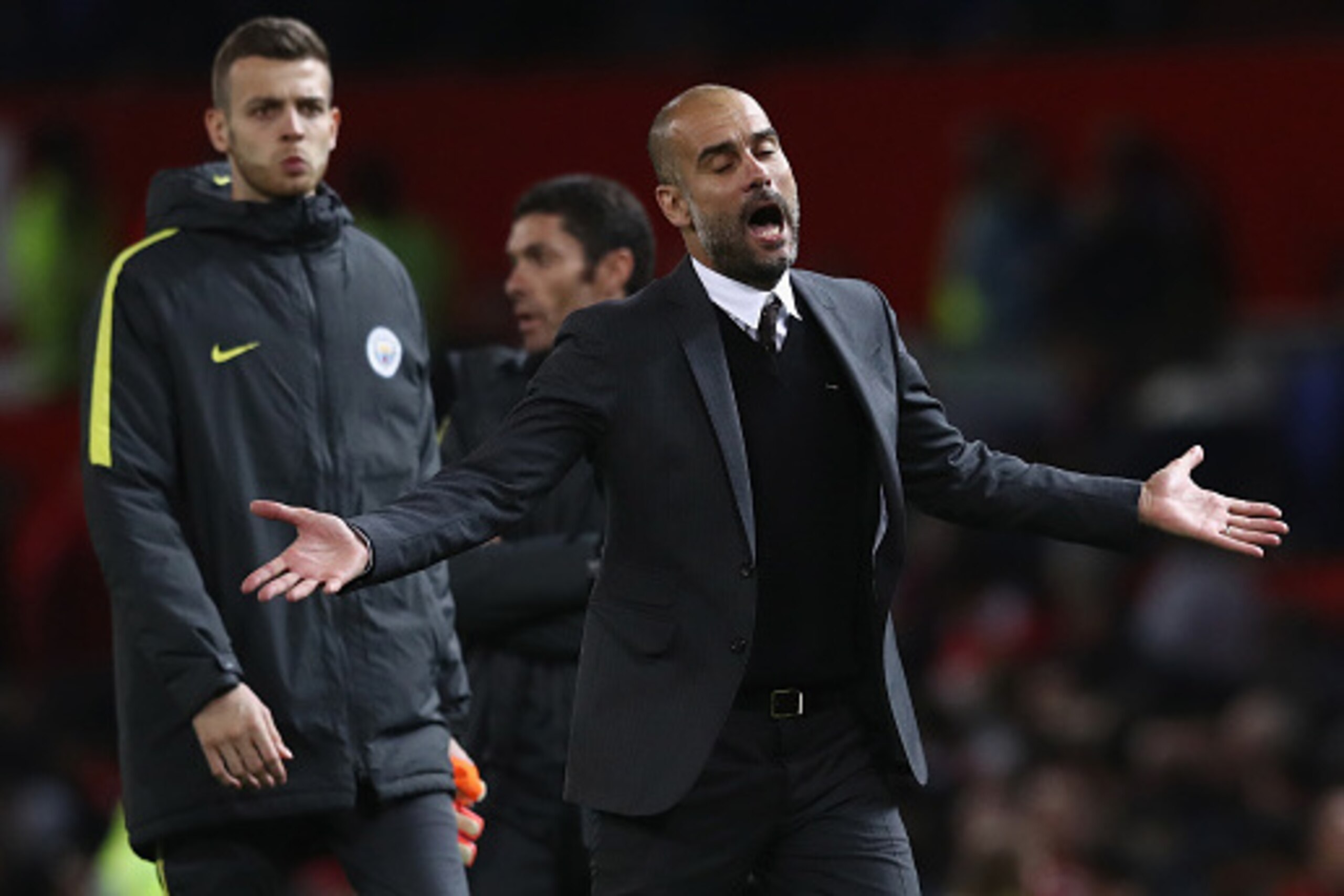 MANCHESTER, ENGLAND - OCTOBER 26:  Josep Guardiola, Manager of Manchester City looks dejected during the EFL Cup Fourth Round match between Manchester United and Manchester City at Old Trafford on October 26, 2016 in Manchester, England.  (Photo by David 