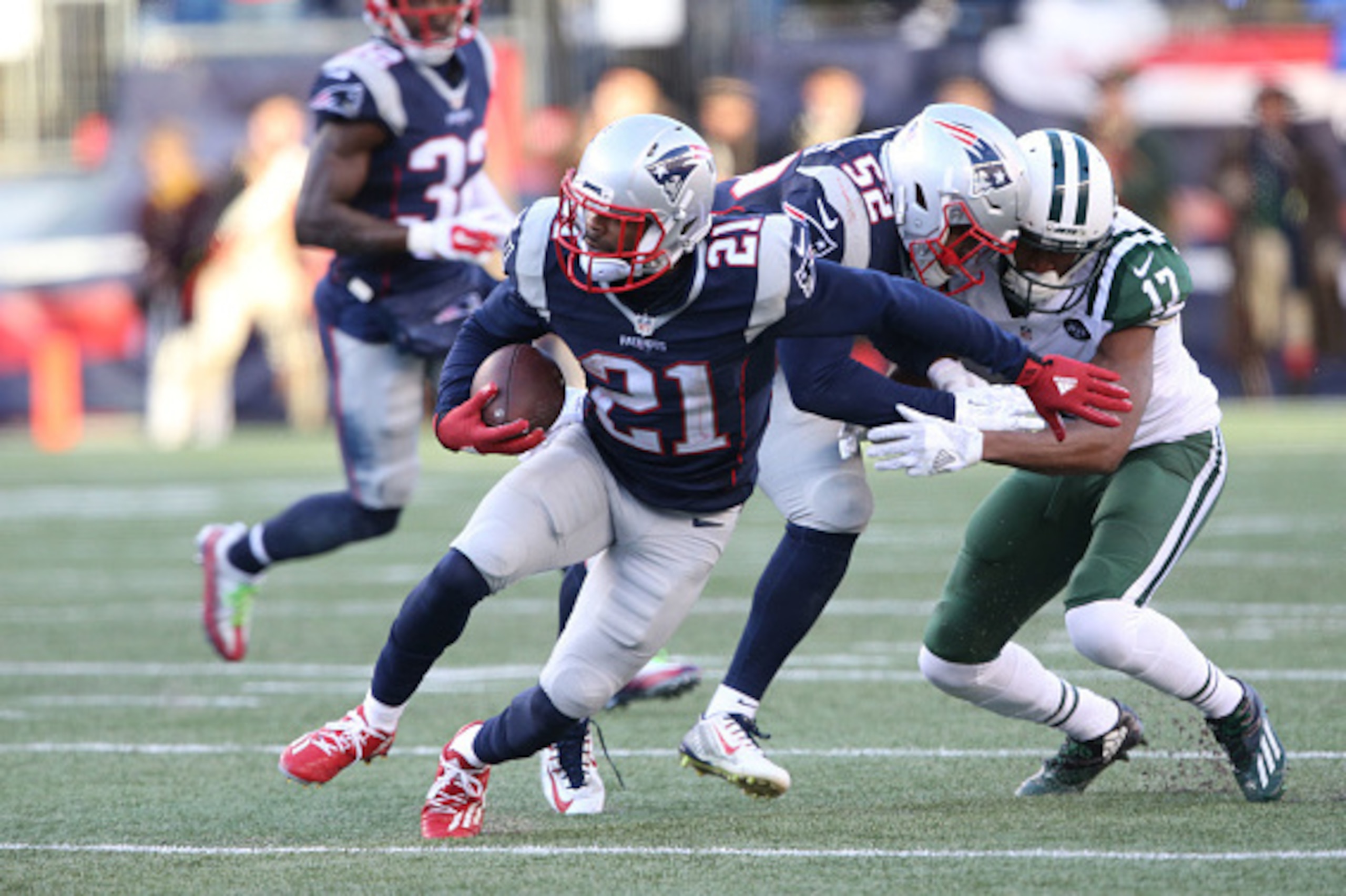 FOXBORO, MA - DECEMBER 24: Cornerback Malcolm Butler #21 of the New England Patriots has an Interception against the New York Jets at Gillette Stadium on December 24, 2016 in Foxboro, Massachusetts. (Photo by Al Pereira/Getty Images)