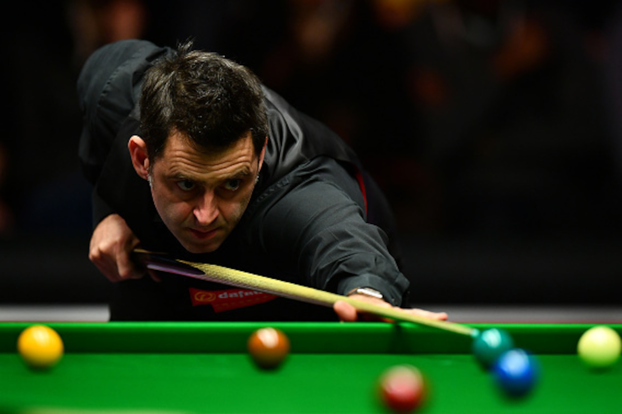 LONDON, ENGLAND - JANUARY 15:  Ronnie O'Sullivan of England plays a shot during his first round match against Liang Wenbo of China on day one of the Dafabet Masters at Alexandra Palace on January 15, 2017 in London, England. (Photo by Dan Mullan/Getty Ima
