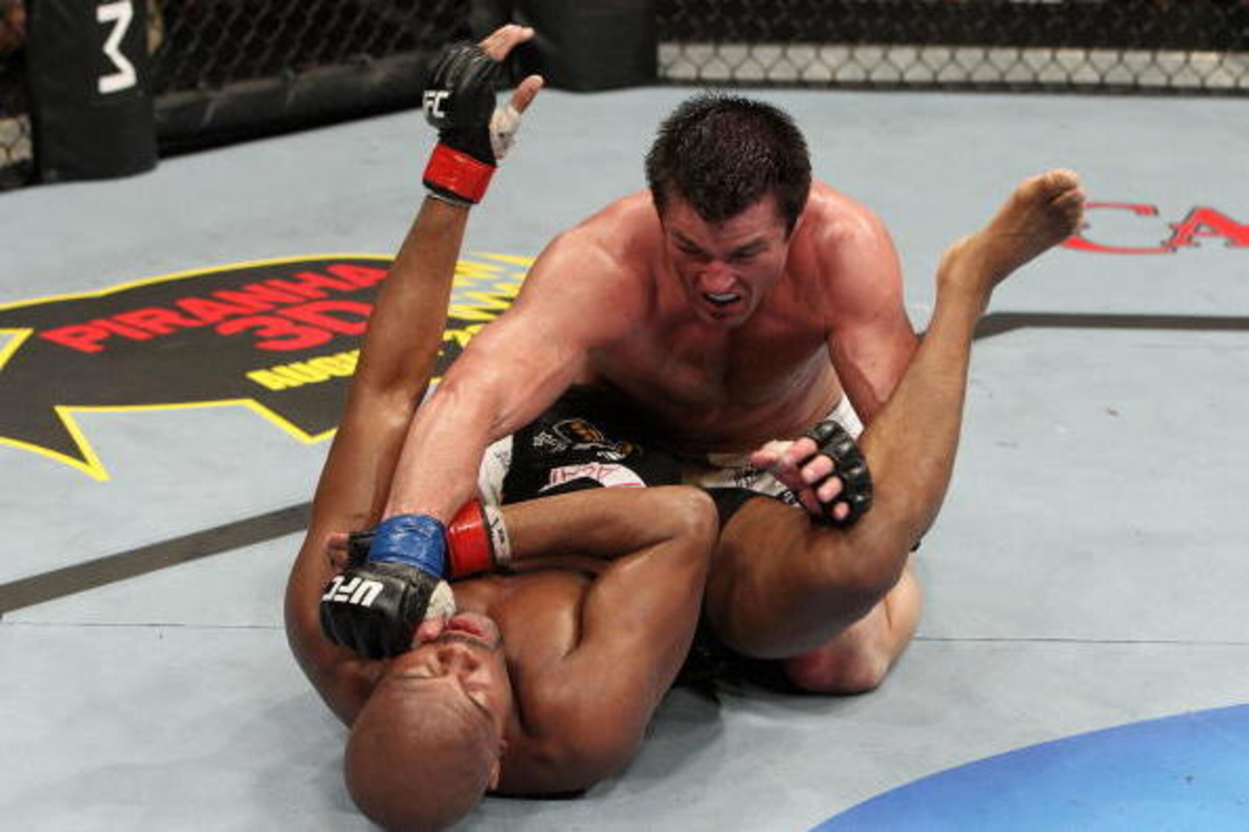 OAKLAND, CA - AUGUST 07:  Chael Sonnen punches Anderson Silva during the UFC Middleweight Championship bout at Oracle Arena on August 7, 2010 in Oakland, California.  (Photo by Josh Hedges/Zuffa LLC/Zuffa LLC via Getty Images)