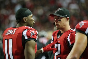 ATLANTA, GA - JANUARY 01: Matt Ryan #2 talks to Julio Jones #11 of the Atlanta Falcons on the sidelines during the first half against the New Orleans Saints at the Georgia Dome on January 1, 2017 in Atlanta, Georgia. (Photo by Maddie Meyer/Getty Images)