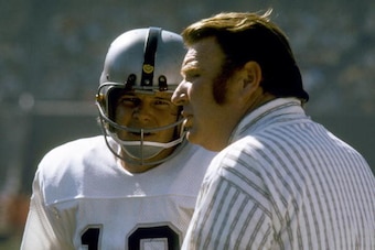 Oakland Raiders head coach John Madden and quarterback Ken Stabler on the sidelines of a 27-17 win over the San Diego Chargers on October 14, 1973 at San Diego Stadium in San Diego, California. (Photo by Richard Stagg/Getty Images)