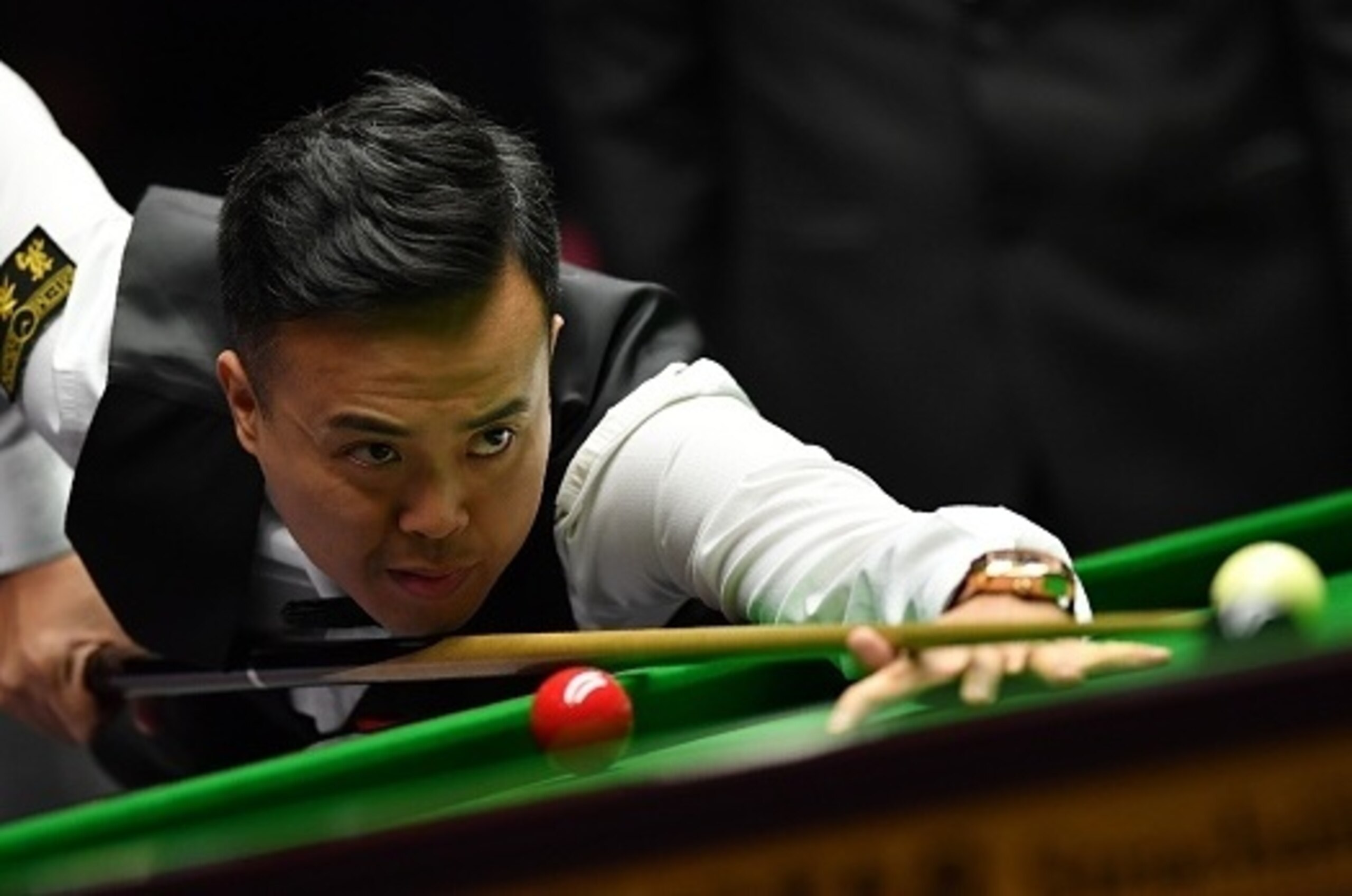 Hong Kong snooker player Marco Fu plays a shot during his quarter-final match against Northern Ireland's Mark Allen during the Masters Snooker tournament at Alexandra Palace in London, on January 19, 2017. / AFP / Ben STANSALL        (Photo credit should 
