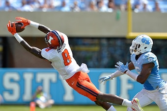 CHAPEL HILL, NC - SEPTEMBER 19: Geronimo Allison #8 of the Illinois Fighting Illini makes as leaping catch as M.J. Stewart #6 of the North Carolina Tar Heels defends during their game at Kenan Stadium on September 19, 2015 in Chapel Hill, North Carolina. 