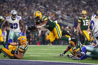 ARLINGTON, TX - JANUARY 15:  Ty Montgomery #88 of the Green Bay Packers dives into the end zone to score a touchdown during the second quarter against the Dallas Cowboys in the NFC Divisional Playoff game at AT&T Stadium on January 15, 2017 in Arlington, 
