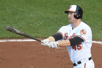 BALTIMORE, MD - AUGUST 18:  Mark Trumbo #45 of the Baltimore Orioles takes a swing during a baseball game against the the Houston Astros at Oriole Park at Camden Yards on August 18, 2016 in Baltimore, Maryland.  The Orioles won 13-5.  (Photo by Mitchell L