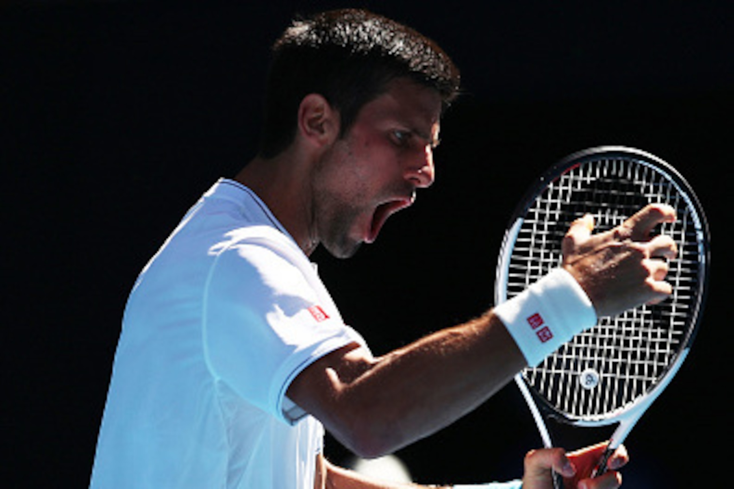 MELBOURNE, AUSTRALIA - JANUARY 19:  Novak Djokovic of Serbia reacts in his second round match against Denis Istomin of Uzbekistan on day four of the 2017 Australian Open at Melbourne Park on January 19, 2017 in Melbourne, Australia.  (Photo by Clive Bruns