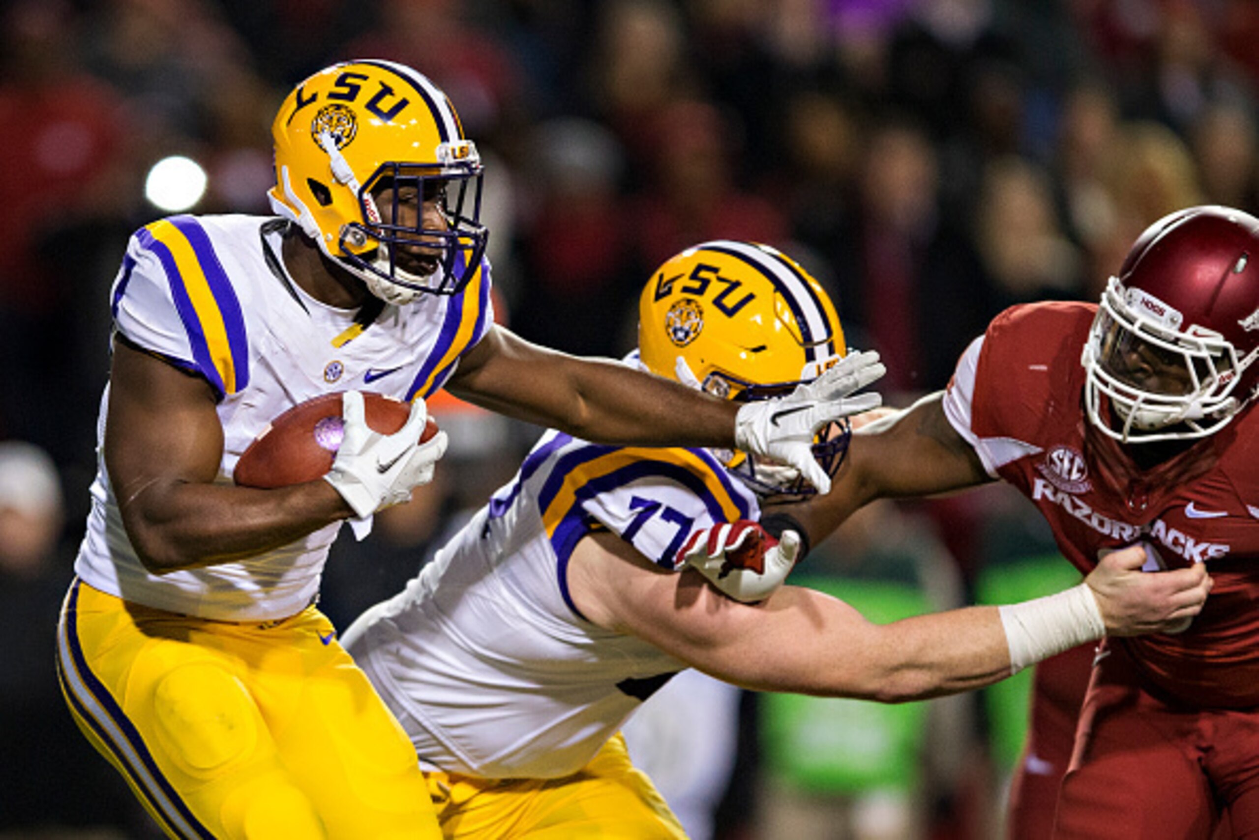 FAYETTEVILLE, AR - NOVEMBER 12:  Leonard Fournette #7 of the LSU Tigers runs the ball during a game against the Arkansas Razorbacks at Razorback Stadium on November 12, 2016 in Fayetteville, Arkansas.  The Tigers defeated the Razorbacks 38-10.  (Photo by 