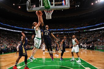BOSTON, MA - JANUARY 7: Kelly Olynyk #41 of the Boston Celtics goes for the dunk during the game against the New Orleans Pelicans on January 7, 2017 at TD Garden in Boston, Masschusetts.  NOTE TO USER: User expressly acknowledges and agrees that, by downl