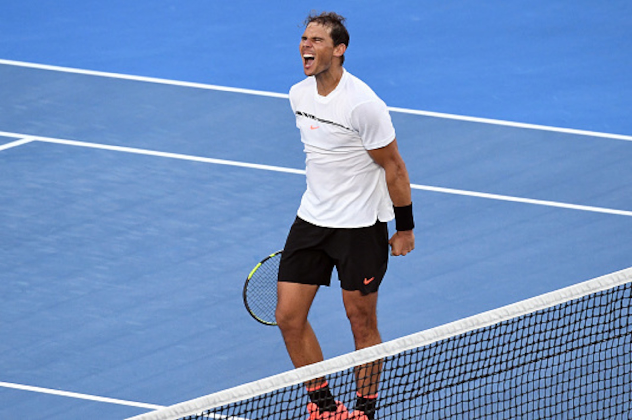 Spain's Rafael Nadal celebrates his victory over Russia's Alexander Zverev in their men's singles third round match on day six of the Australian Open tennis tournament in Melbourne on January 21, 2017. / AFP / SAEED KHAN / --IMAGE RESTRICTED TO EDITORIAL Spain's Rafael Nadal celebrates his victory over Russia's Alexander Zverev in their men's singles third round match on day six of the Australian Open tennis tournament in Melbourne on January 21, 2017. / AFP / SAEED KHAN / --IMAGE RESTRICTED TO EDITORIAL