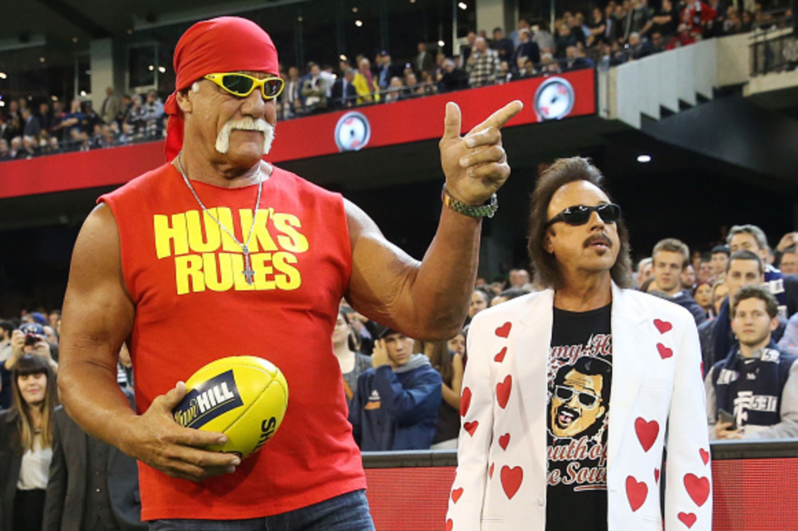 MELBOURNE, VICTORIA - MAY 01:  Wrestler Hulk Hogan gestures to the crowd while making an appearance during the round five AFL match between the Carlton Blues and the Collingwood Magpies at Melbourne Cricket Ground on May 1, 2015 in Melbourne, Australia.  