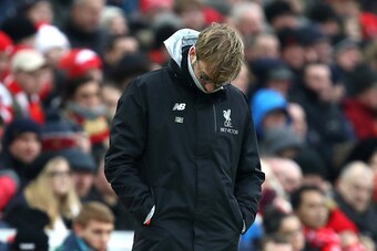 LIVERPOOL, ENGLAND - JANUARY 21: Jurgen Klopp, Manager of Liverpool looks dejected during the Premier League match between Liverpool and Swansea City at Anfield on January 21, 2017 in Liverpool, England.  (Photo by Julian Finney/Getty Images)