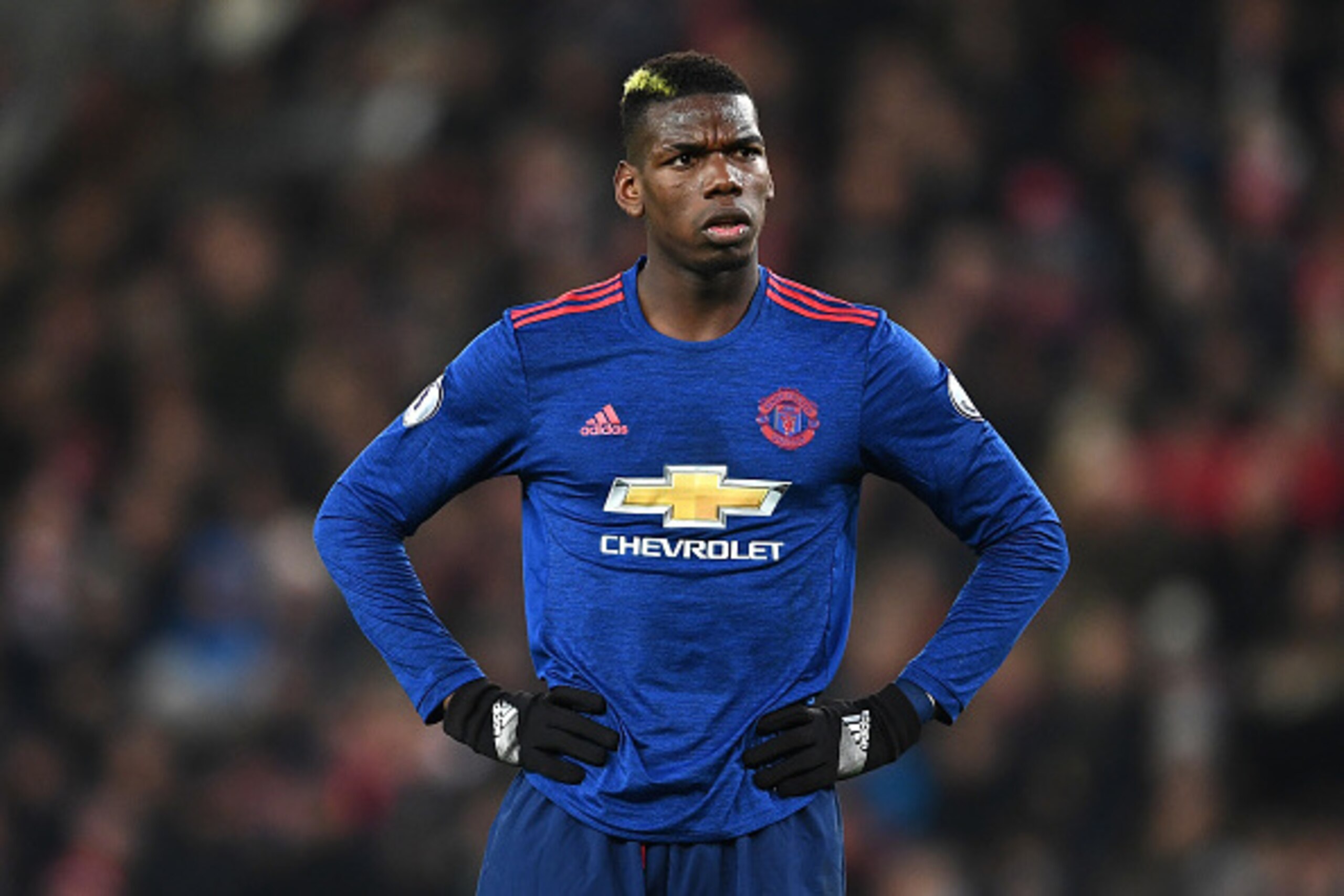 STOKE ON TRENT, ENGLAND - JANUARY 21: Paul Pogba of Manchester United looks on during the Premier League match between Stoke City and Manchester United at Bet365 Stadium on January 21, 2017 in Stoke on Trent, England. (Photo by Laurence Griffiths/Getty STOKE ON TRENT, ENGLAND - JANUARY 21: Paul Pogba of Manchester United looks on during the Premier League match between Stoke City and Manchester United at Bet365 Stadium on January 21, 2017 in Stoke on Trent, England. (Photo by Laurence Griffiths/Getty