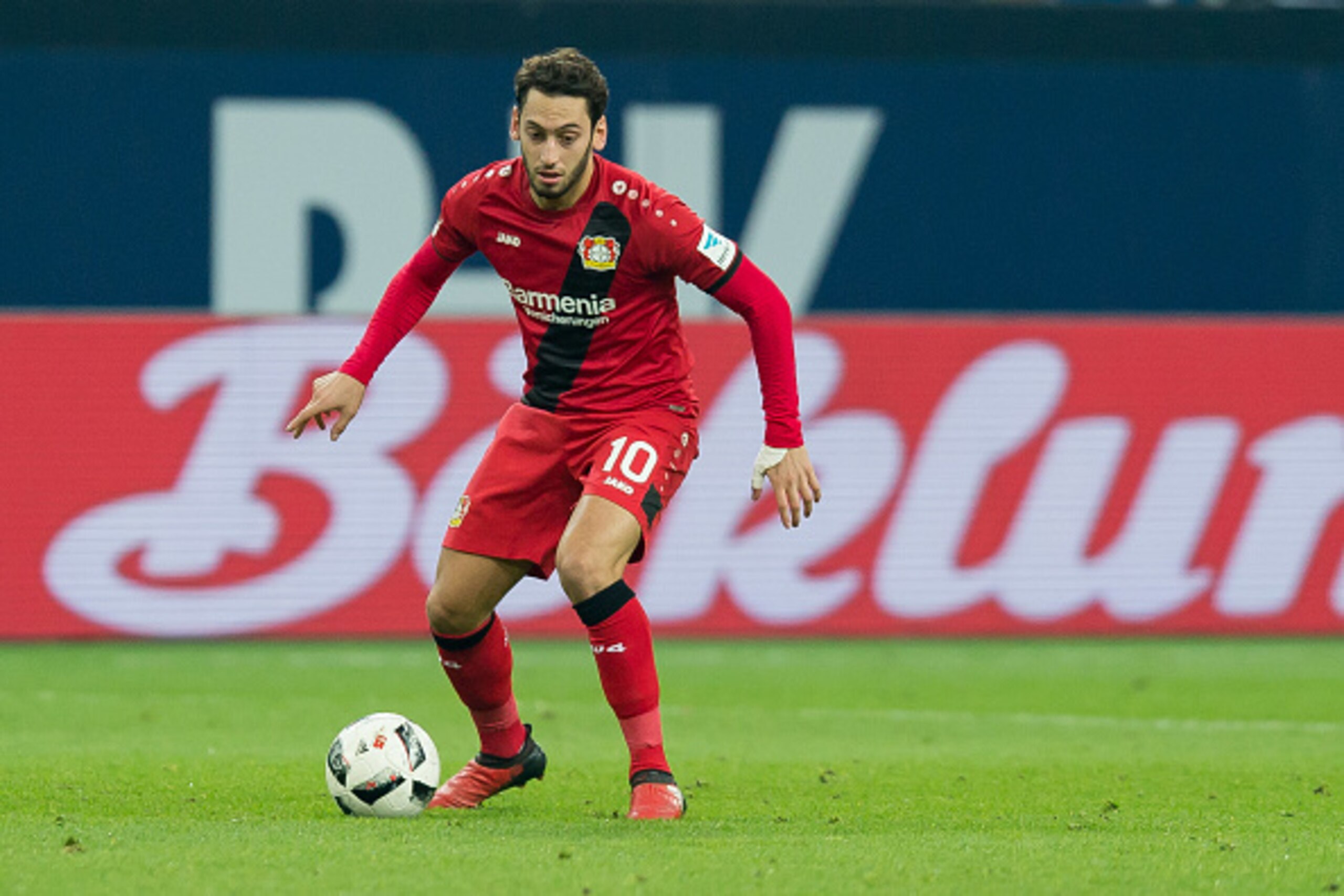 GELSENKIRCHEN, GERMANY - DECEMBER 11: Hakan Calhanoglu of Leverkusen in action during the Bundesliga match between FC Schalke 04 and Bayer 04 Leverkusen at Veltins-Arena on December 11, 2016 in Gelsenkirchen, Germany. (Photo by TF-Images/Getty Images)