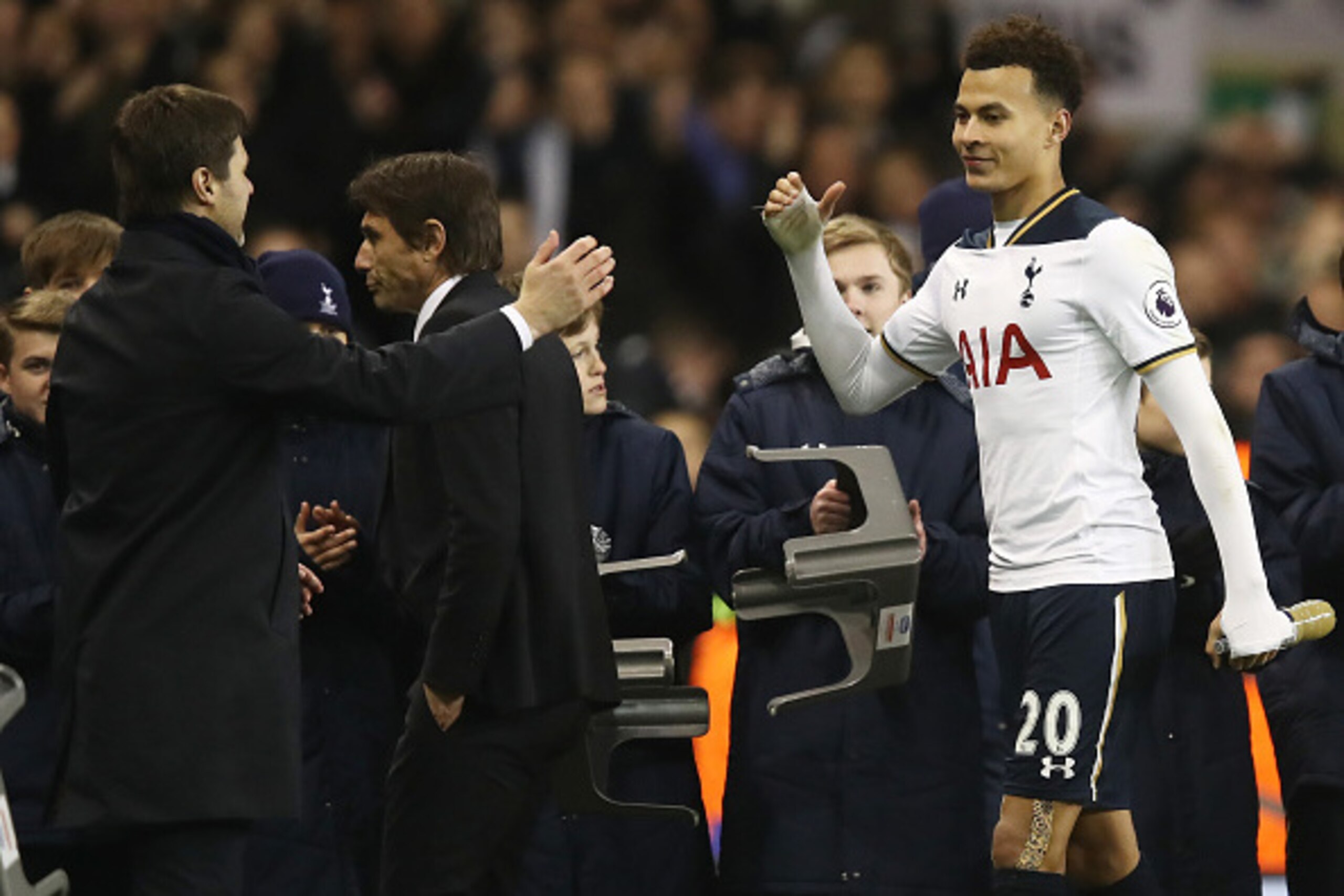 LONDON, ENGLAND - JANUARY 04: Mauricio Pochettino, Manager of Tottenham Hotspur (L) and Dele Alli of Tottenham Hotspur (R) embrace after the the Premier League match between Tottenham Hotspur and Chelsea at White Hart Lane on January 4, 2017 in London, En LONDON, ENGLAND - JANUARY 04: Mauricio Pochettino, Manager of Tottenham Hotspur (L) and Dele Alli of Tottenham Hotspur (R) embrace after the the Premier League match between Tottenham Hotspur and Chelsea at White Hart Lane on January 4, 2017 in London, En