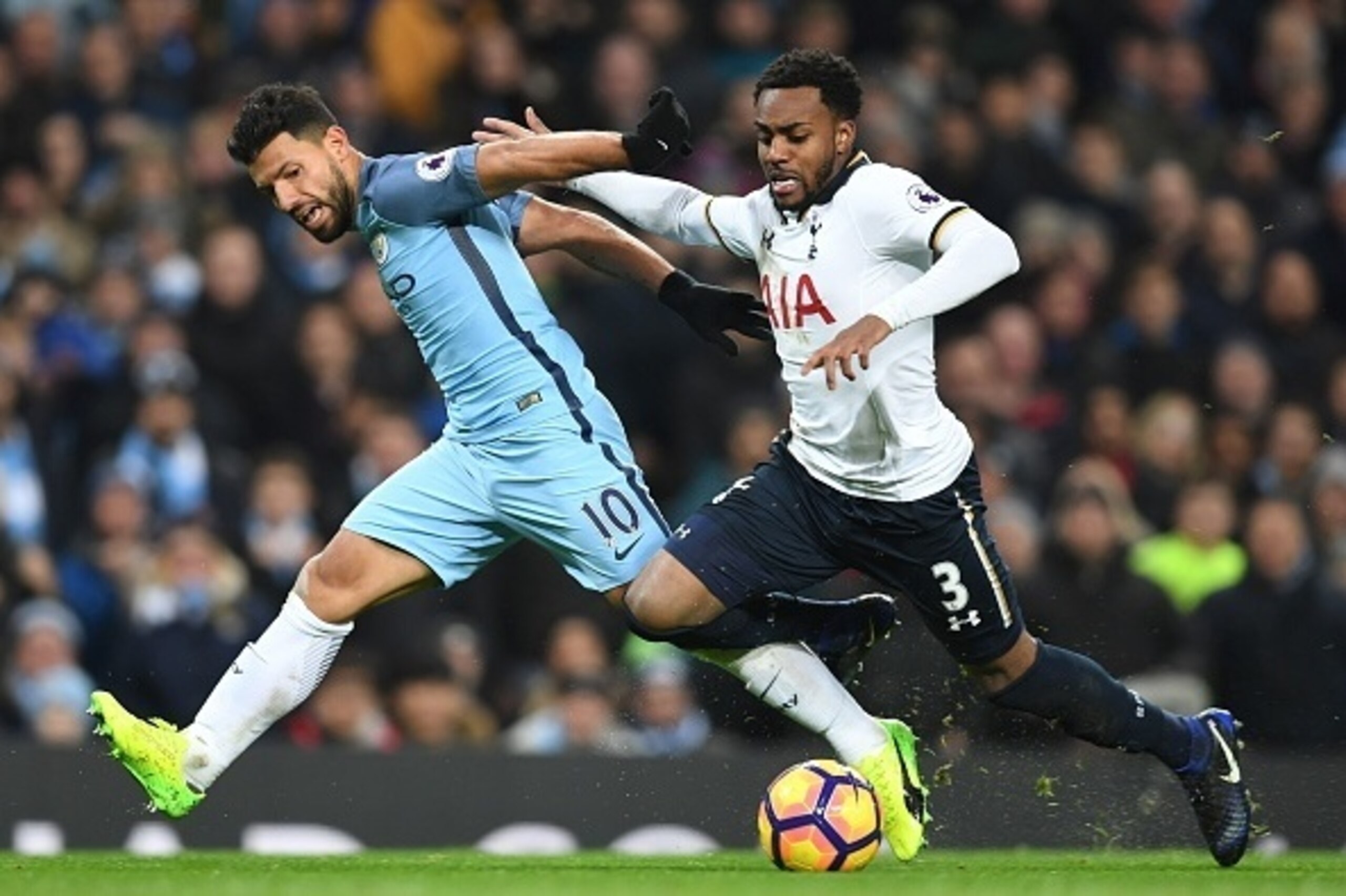 Manchester City's Argentinian striker Sergio Aguero (L) vies with Tottenham Hotspur's English defender Danny Rose during the English Premier League football match between Manchester City and Tottenham Hotspur at the Etihad Stadium in Manchester, north wes Manchester City's Argentinian striker Sergio Aguero (L) vies with Tottenham Hotspur's English defender Danny Rose during the English Premier League football match between Manchester City and Tottenham Hotspur at the Etihad Stadium in Manchester, north wes