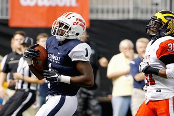 ST. PETERSBURG, FL - JANUARY 21:  West's Eli McGuire #1 of Louisiana-Lafayette finds room to run for a touchdown during the third quarter of the East-West Shrine Game at Tropicana Field on January 21, 2017, in St. Petersburg, Florida. (Photo by Joseph Gar