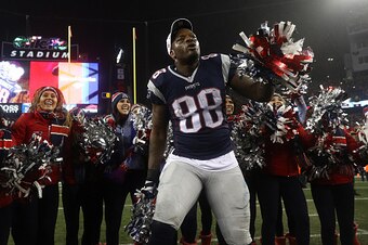 FOXBORO, MA - JANUARY 22: Martellus Bennett #88 of the New England Patriots celebrates with cheerleaders after defeating the Pittsburgh Steelers 36-17 to win the AFC Championship Game at Gillette Stadium on January 22, 2017 in Foxboro, Massachusetts. (Pho