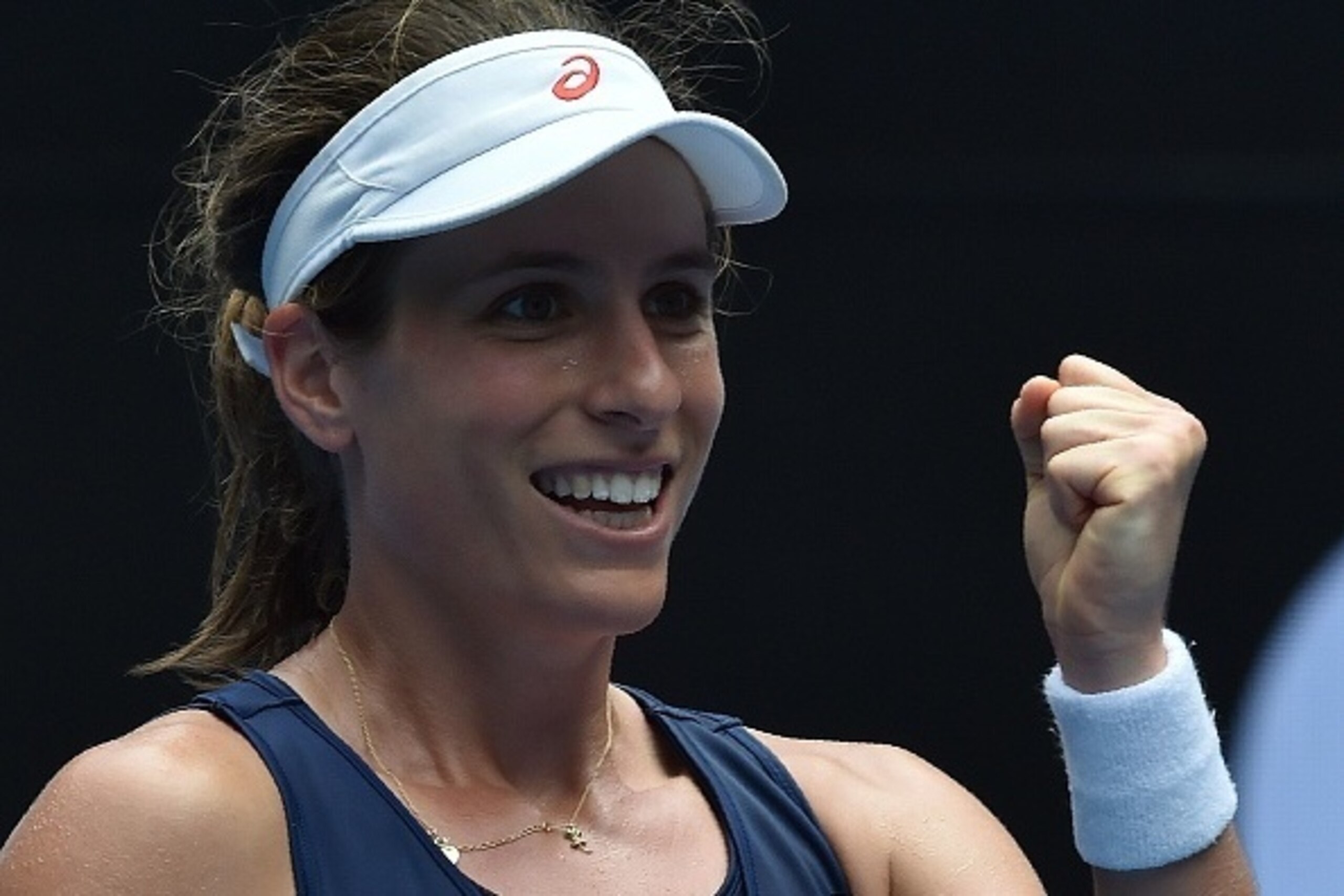 Johanna Konta of Britain celebrates her win against Russia's Ekaterina Makarova during their women's match in the fourth round on day 8 of the Australian Open tennis tournament in Melbourne on January 23, 2017.  / AFP / PAUL CROCK / IMAGE RESTRICTED TO ED