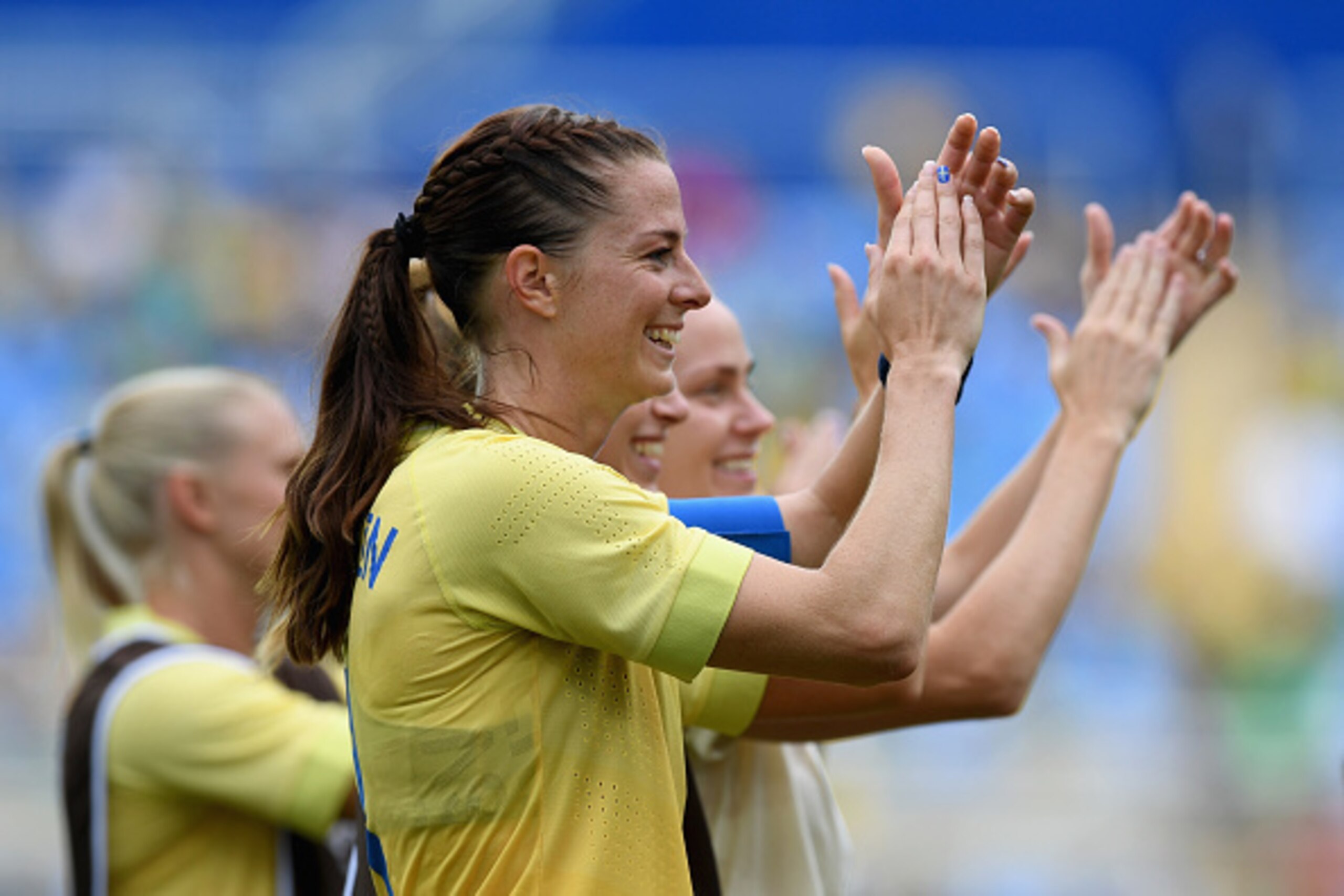 RIO DE JANEIRO, BRAZIL - AUGUST 03:  Lotta Schelin of Sweden (8) applauds the crowd with team mates after the Women's Group E first round match between Sweden and South Africa during the Rio 2016 Olympic Games at the Olympic Stadium on August 3, 2016 in R
