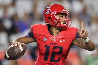 GLENDALE, AZ - SEPTEMBER 03:  Quarterback Anu Solomon #12 of the Arizona Wildcats throws a pass during the college football game against the Brigham Young Cougars at University of Phoenix Stadium on September 3, 2016 in Glendale, Arizona. The Cougars defe